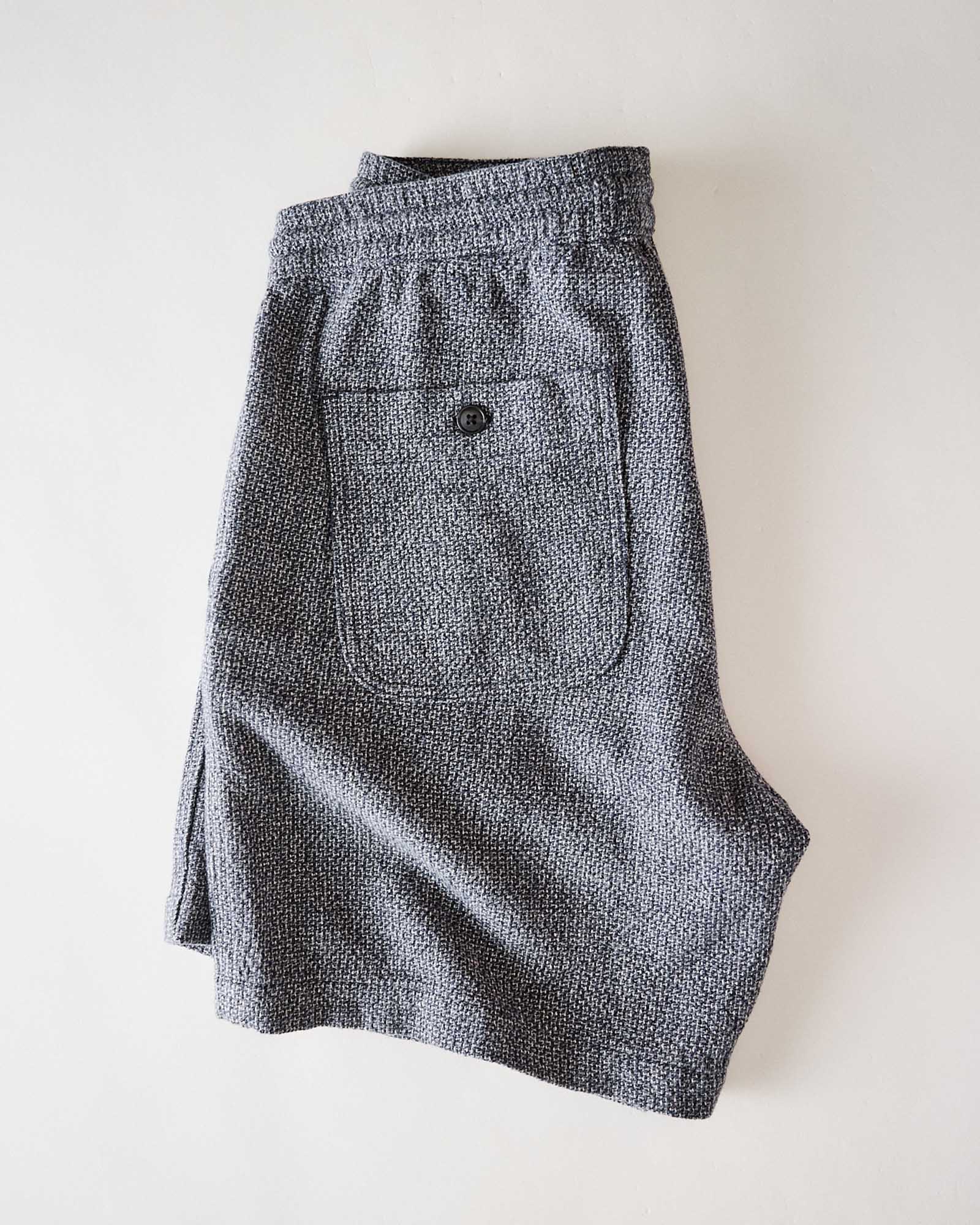 flatlay of the back of The Apres Short in Navy Linen Tweed folded, Bottoms by Taylor Stitch