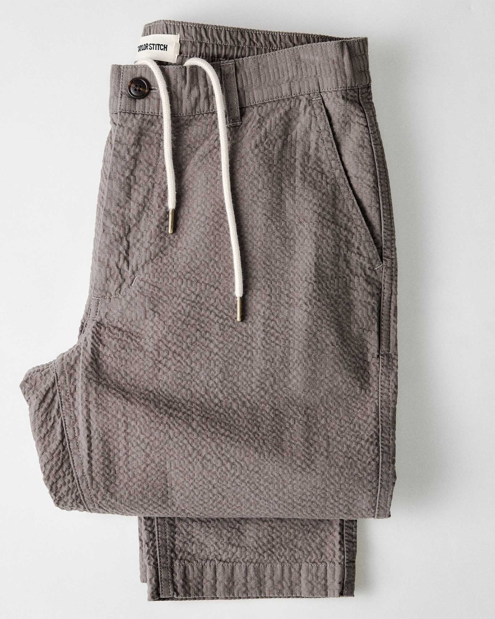 folded flatlay of The Easy Pant in Canteen Seersucker, Bottoms by Taylor Stitch