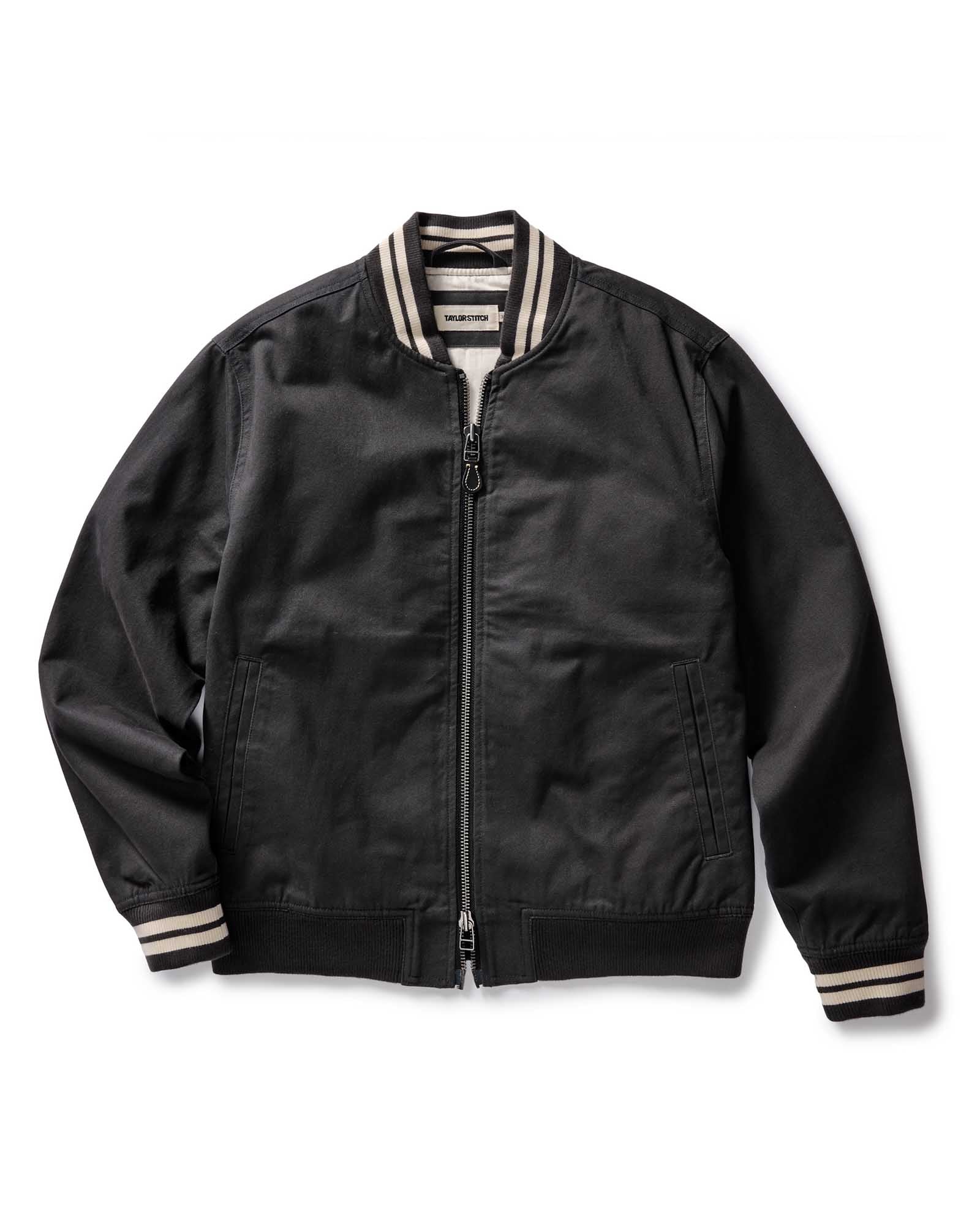 flatlay of The Speedway Bomber in Organic Faded Black Twill, Outerwear by Taylor Stitch