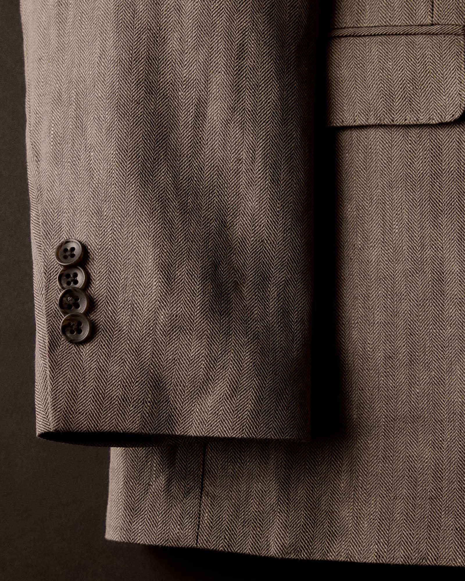 editorial image of the buttons on The Stevens Sportcoat in Coffee Linen Herringbone, Outerwear by Taylor Stitch