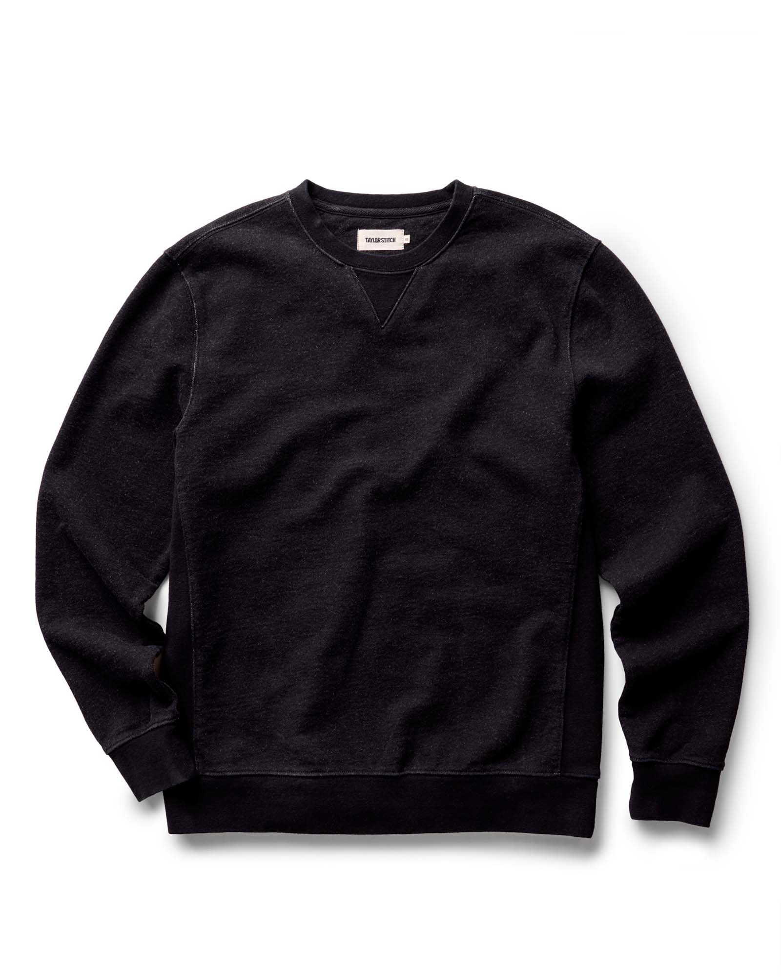 flatlay of The Apres Crew in Black Indigo Terry, Knits by Taylor Stitch