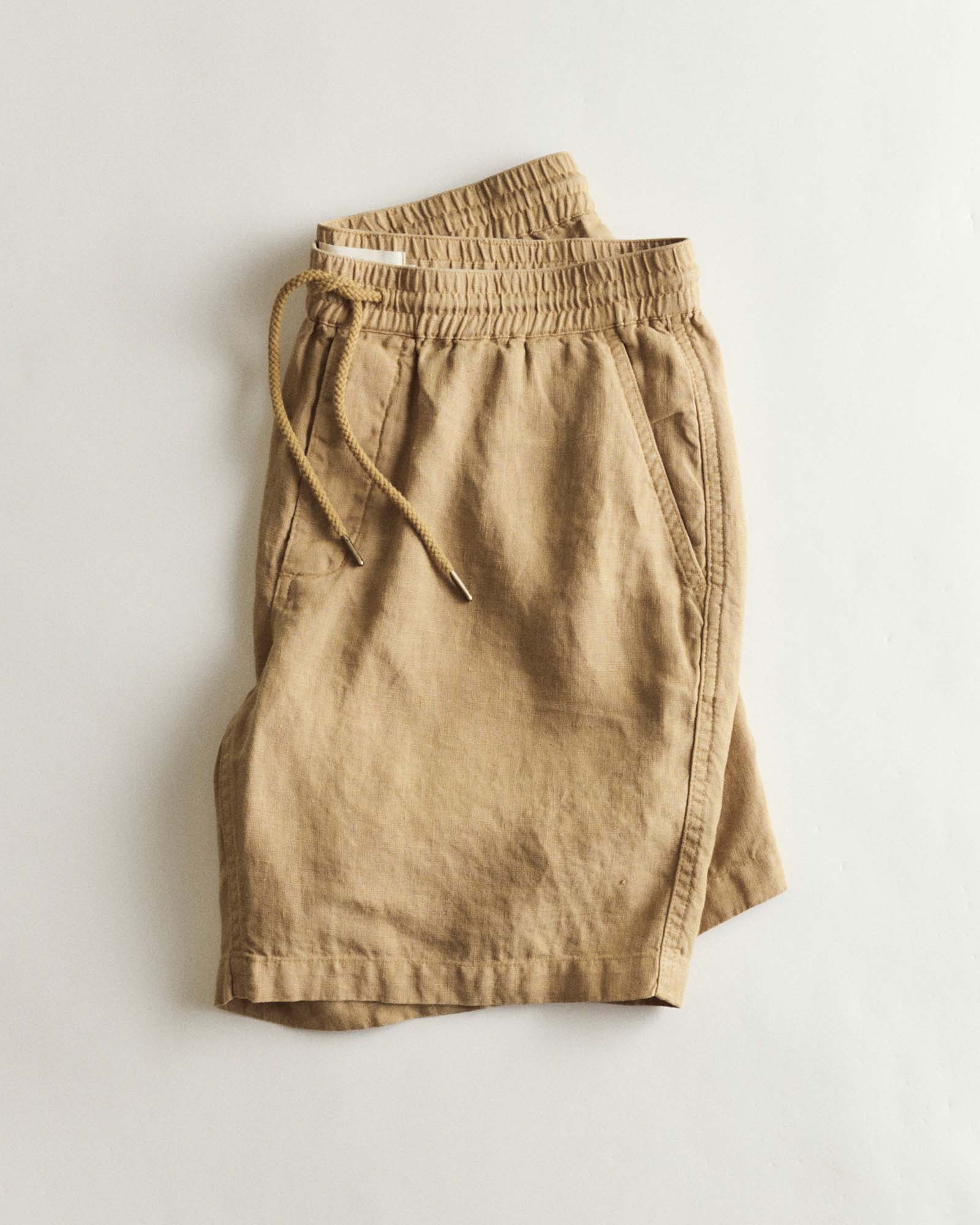 folded flatlay of The Apres Short in Wheat Hemp, Bottoms by Taylor Stitch