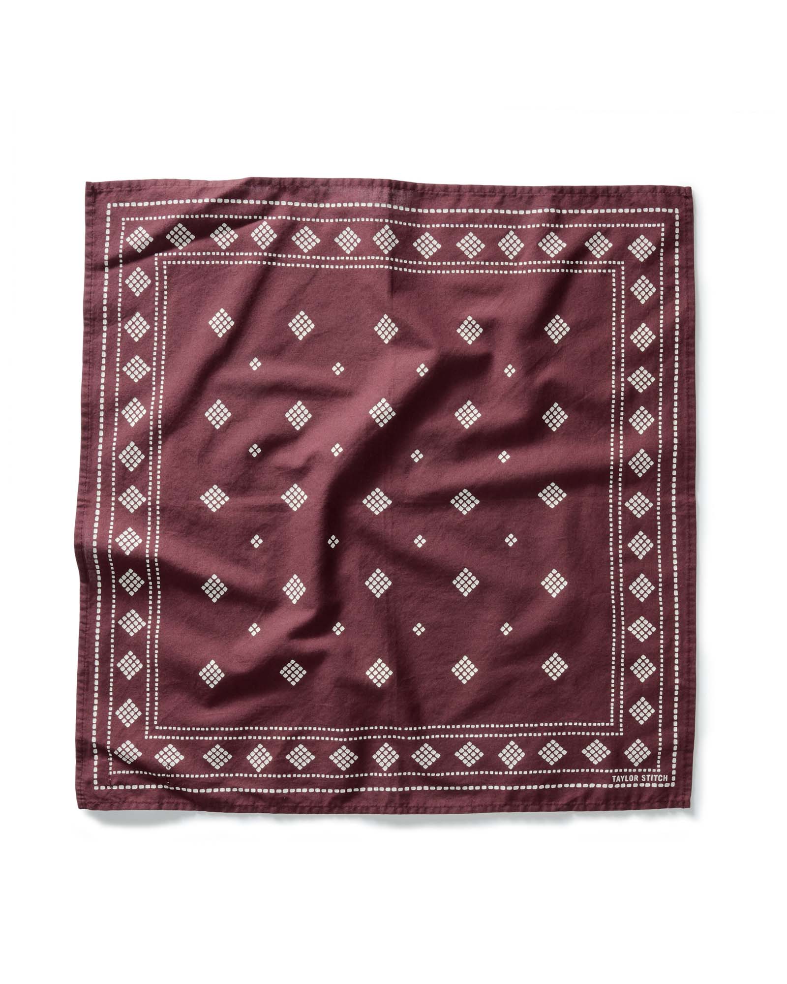 flatlay of The Bandana in Dried Cherry Diamond, Accessories by Taylor Stitch
