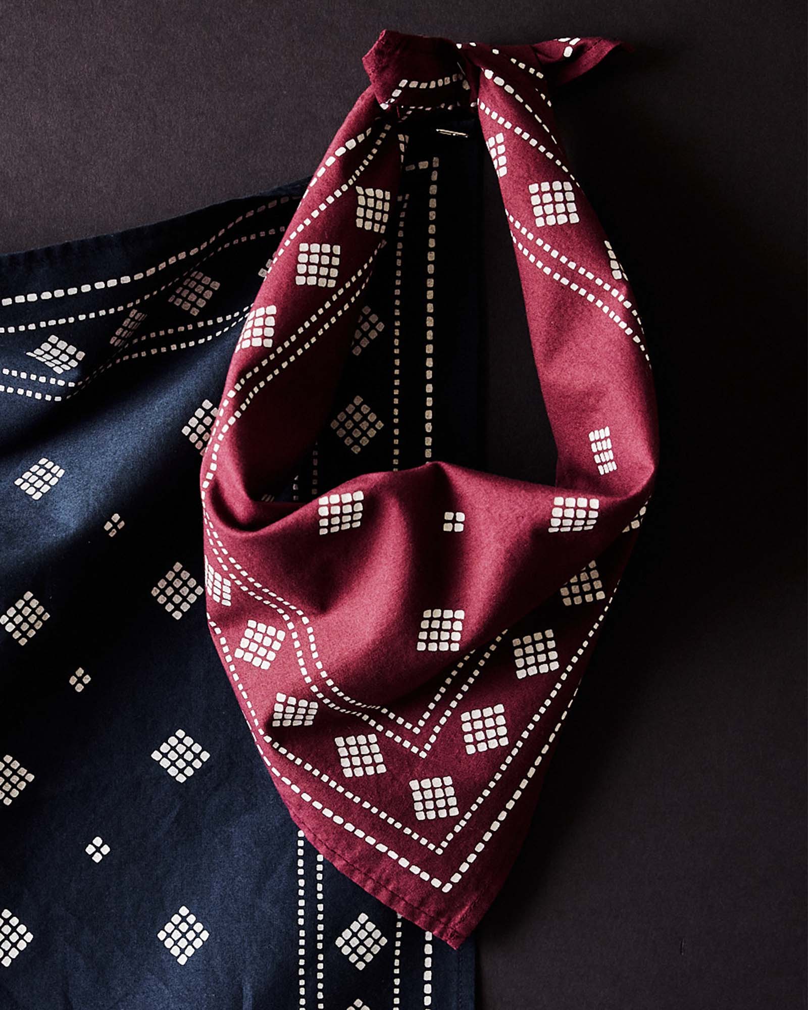 editorial image of The Bandana in Dried Cherry Diamond tied, Accessories by Taylor Stitch