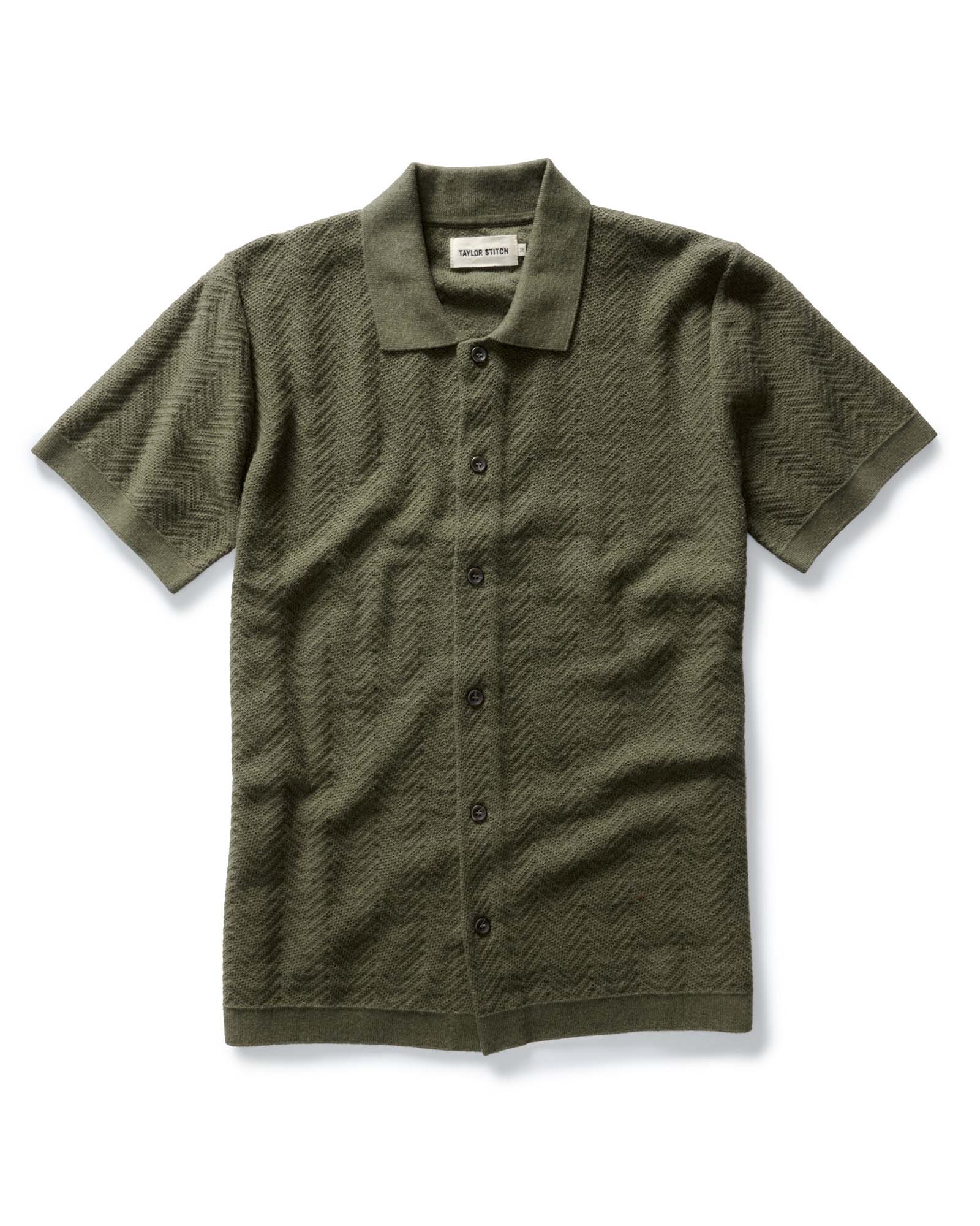 flatlay of The Button Down Polo in Cilantro Herringbone, Knits by Taylor Stitch