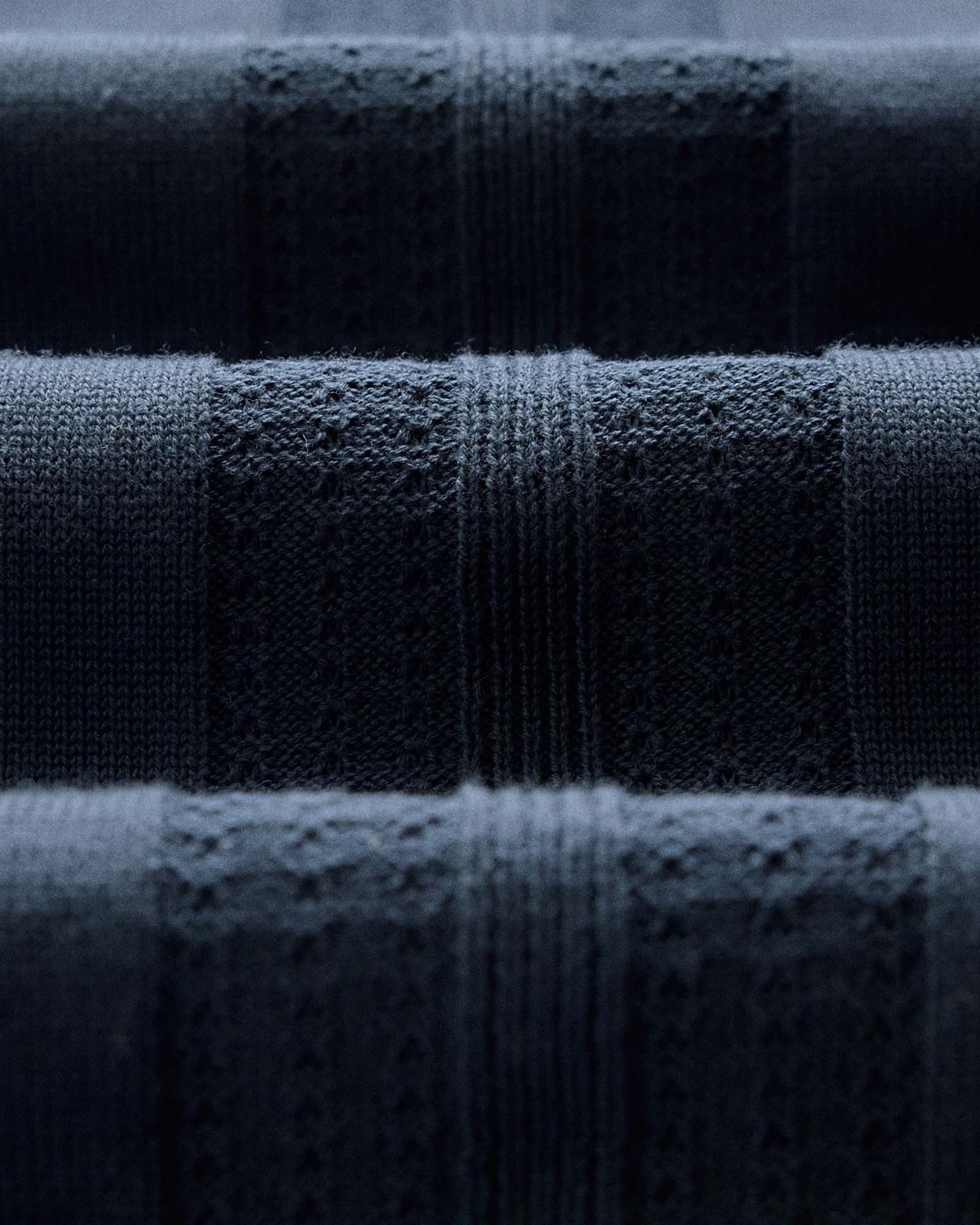 material shot of the fabric on The Button Down Polo in Dark Navy Stripe, Knits by Taylor Stitch