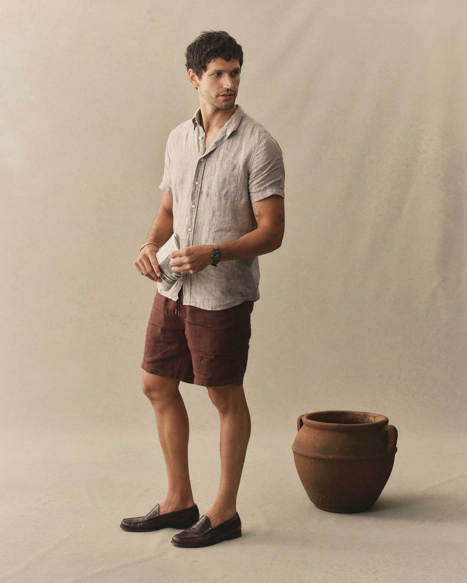 fit model posing in The Apres Short in Burgundy Hemp, Bottoms by Taylor Stitch