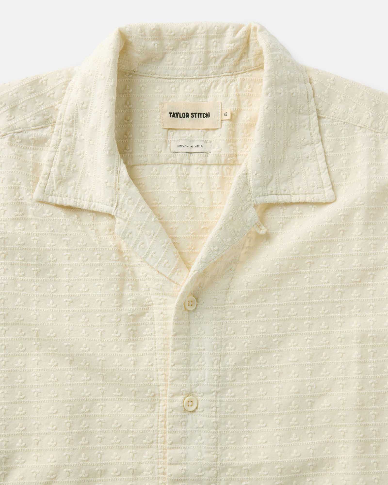mateiral shot of the collar on The Davis Shirt in Vintage White Embroidered Stripe, Wovens by Taylor Stitch