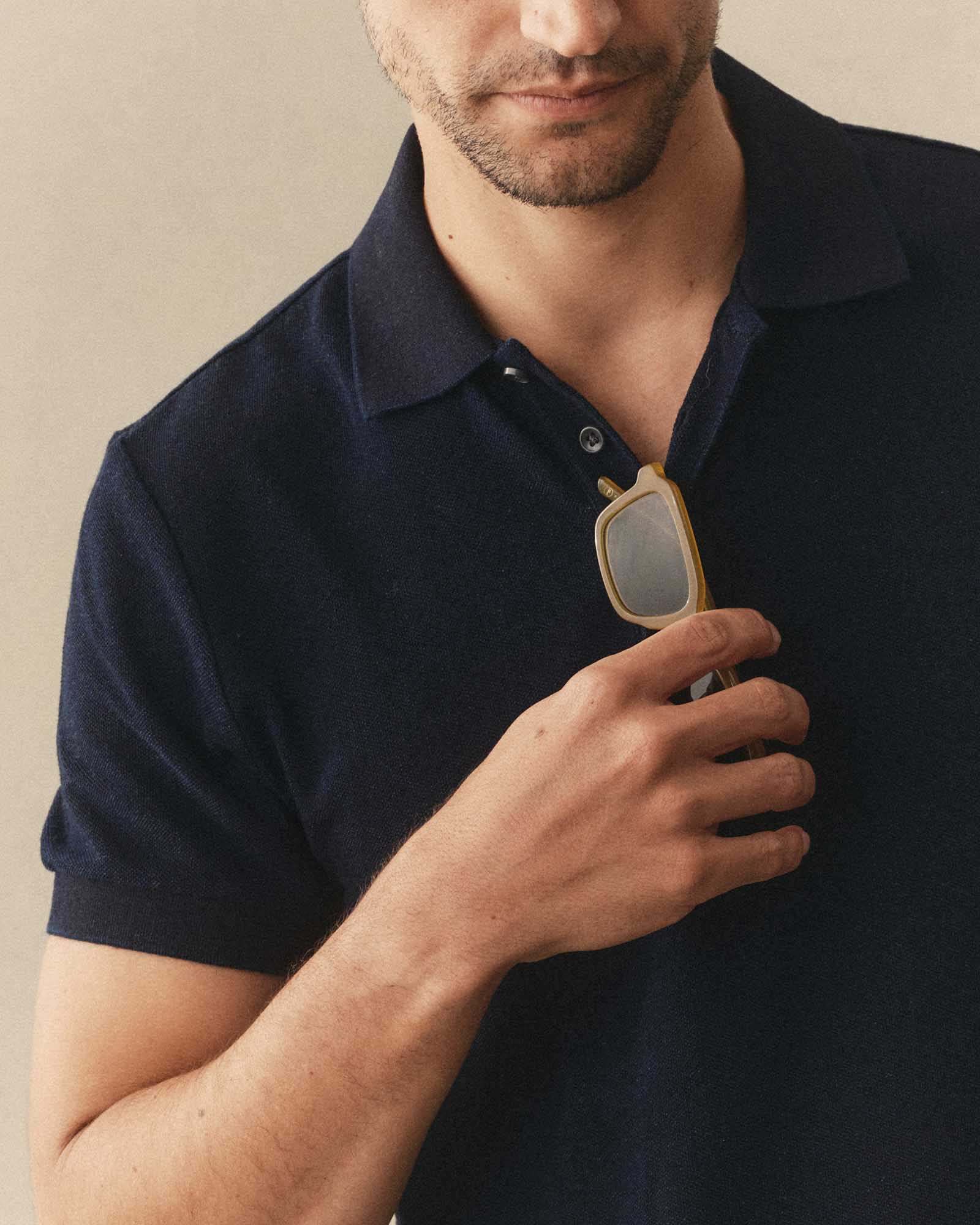 fit model showing off The Pacific Polo in Rinsed Indigo Pique, Knits by Taylor Stitch
