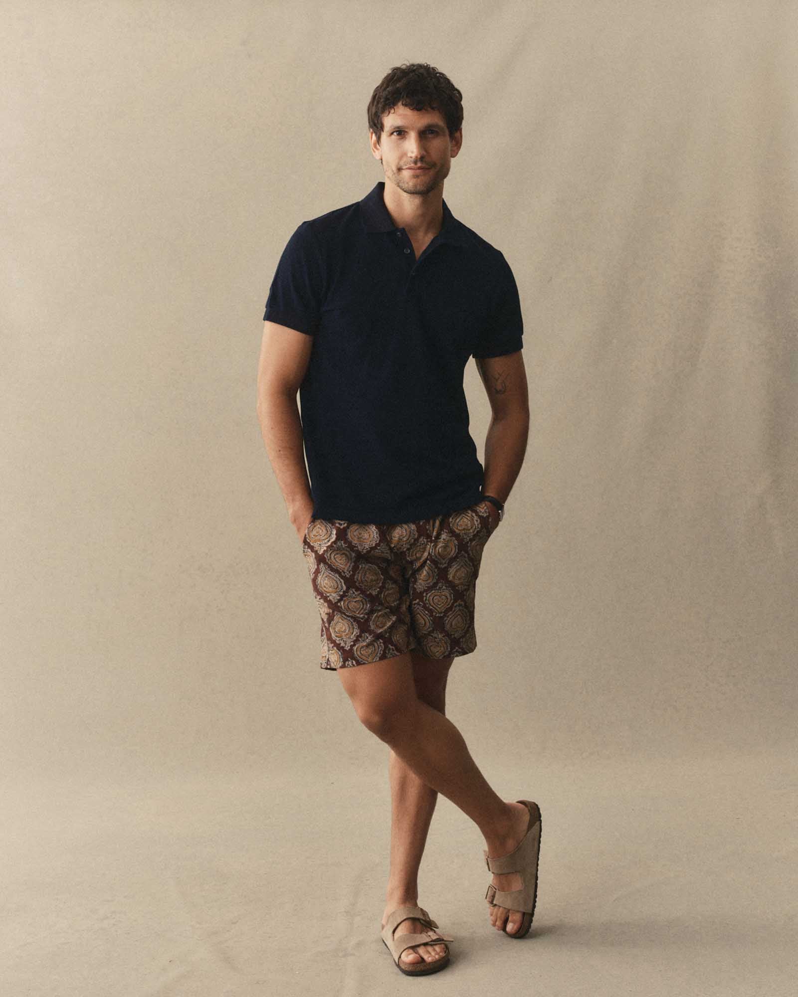 fit model wearing The Pacific Polo in Rinsed Indigo Pique, Knits by Taylor Stitch