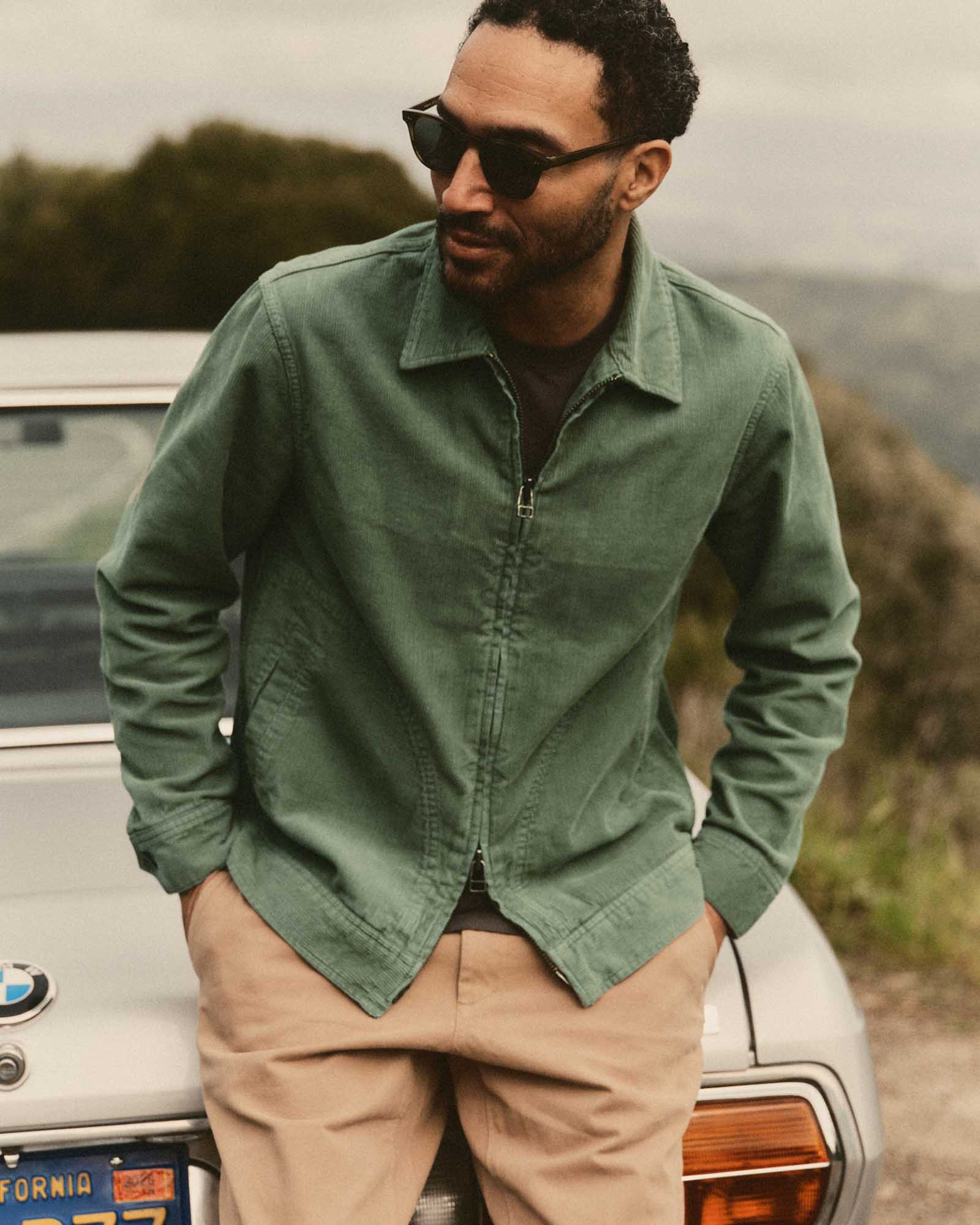 fit model posing in The Piston Jacket in Ivy Corduroy, Outerwear by Taylor Stitch