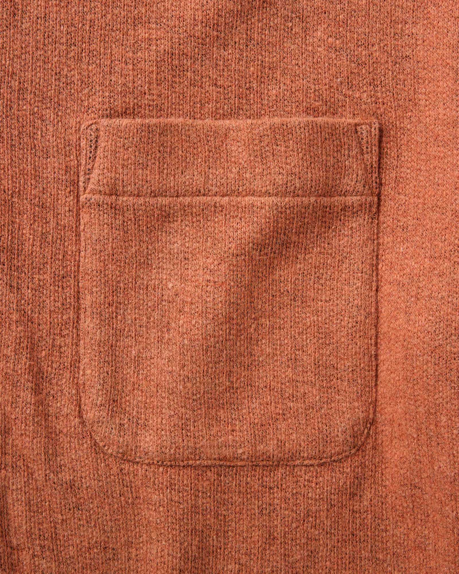 material shot of the pocket on The Short Sleeve California in Heather Driftwood Double Knit, Knits by Taylor Stitch