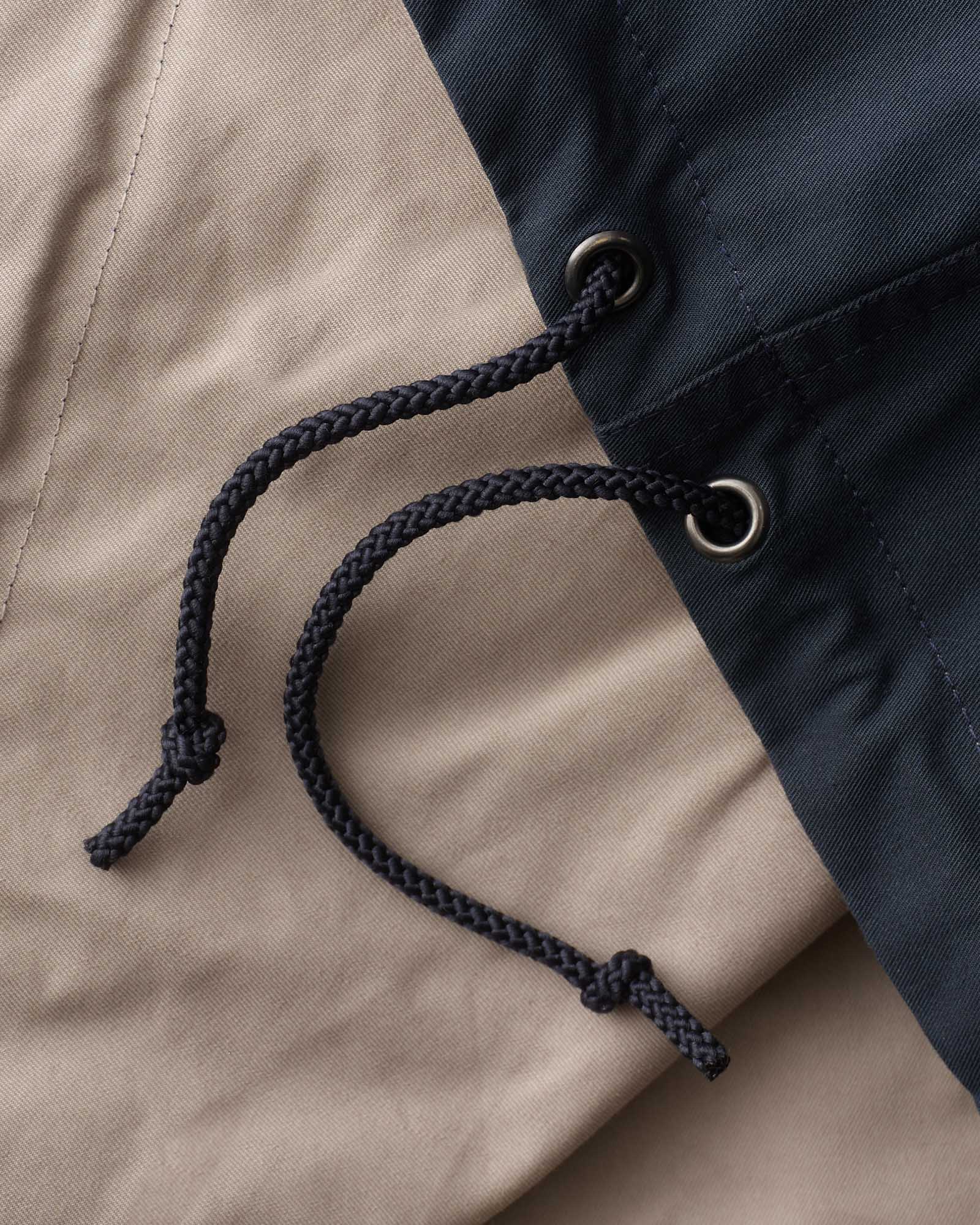 fit model showing off the hood on The Squall Anorak in Navy Twill, Outerwear by Taylor Stitch