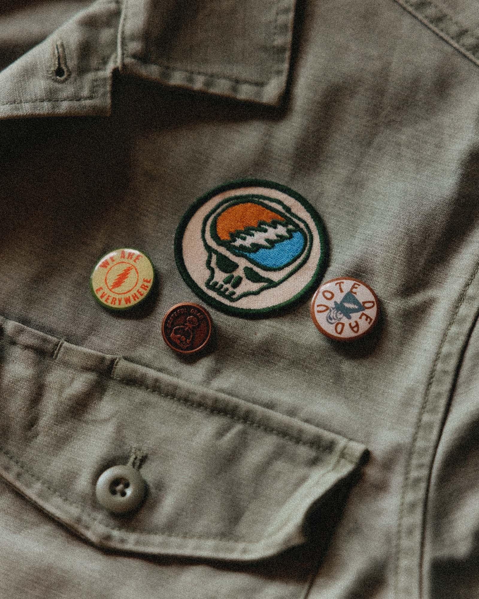 editorial image of The Magoo’s Pin Set on a jacket, Accessories by Taylor Stitch