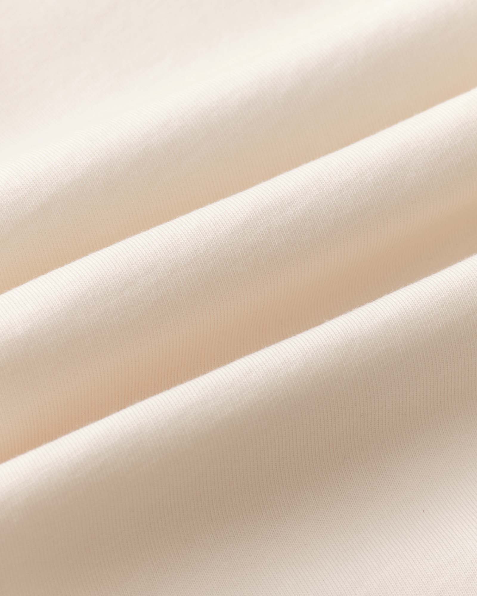 material shot of the fabric on The Organic Cotton Tee in Team Dead, Knits by Taylor Stitch