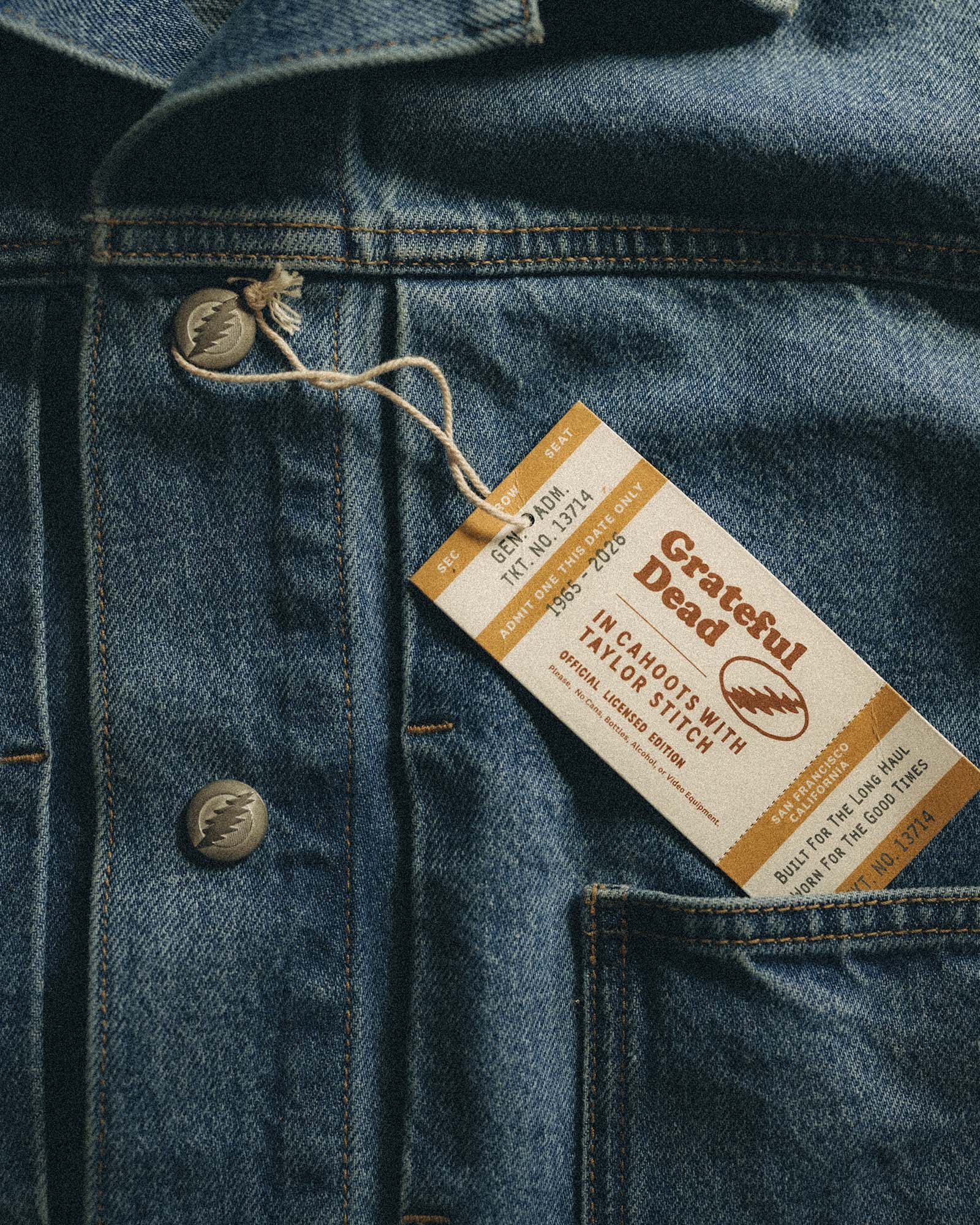editorial image of the tag on The Haight Jacket in Light Wash Hemp Denim, Outerwear by Taylor Stitch