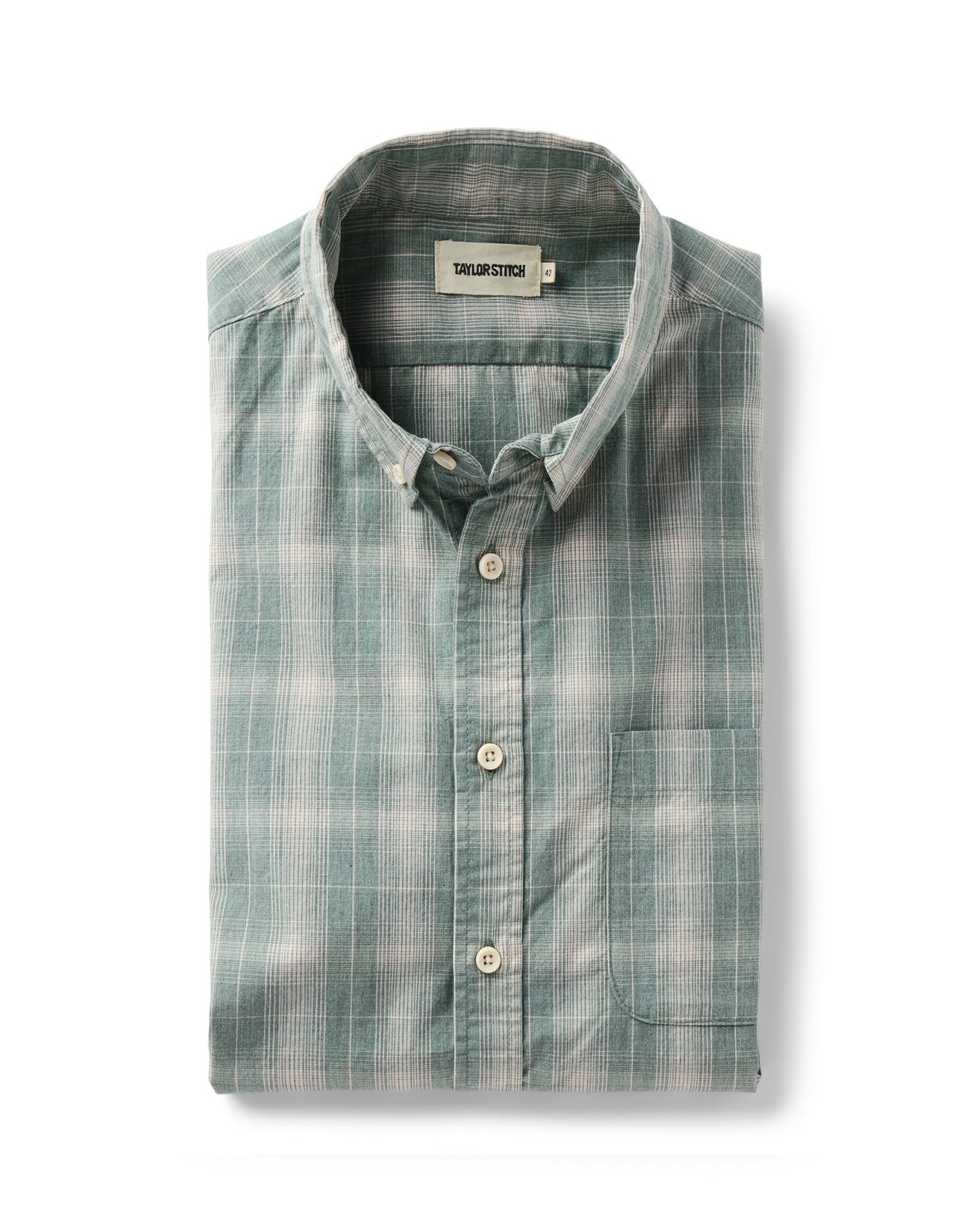folded flatlay of The Jack in Sea Moss Plaid, Wovens by Taylor Stitch