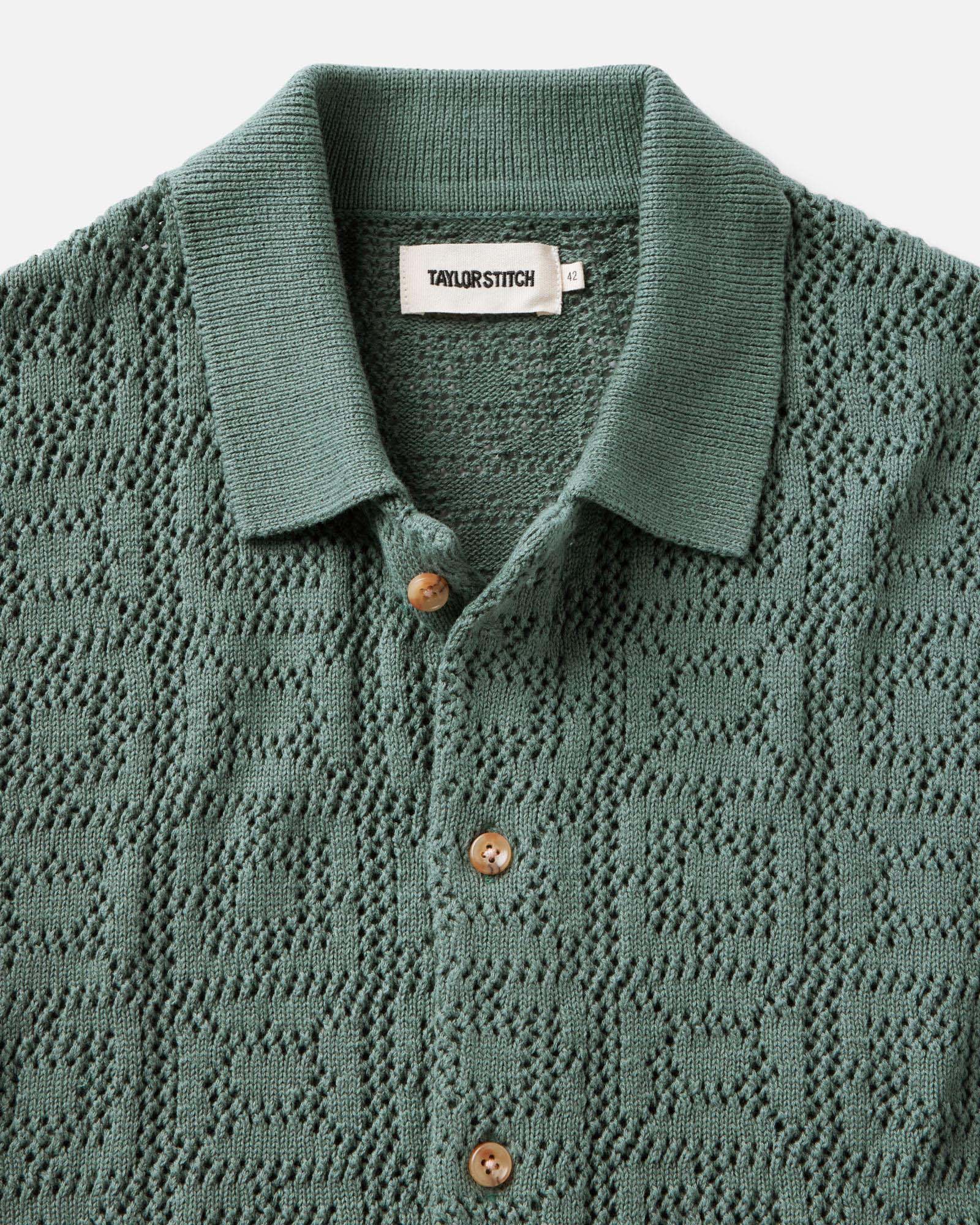 material shot of the collar on The Monterey Sweater Polo in Deep Sea Geo Crochet, Knits by Taylor Stitch