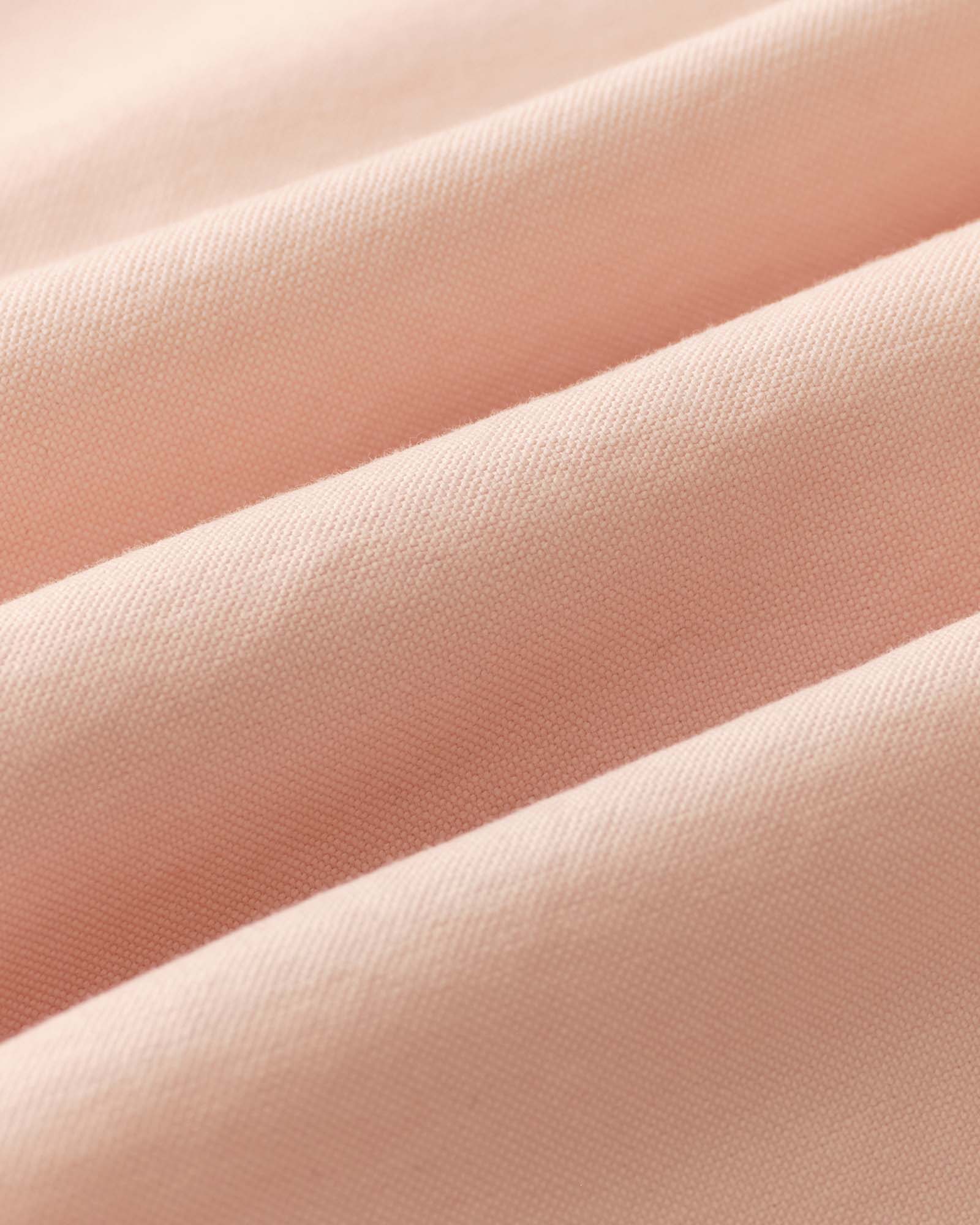 material shot of the fabric on The Stageworn Jack in Pale Rose Oxford, Wovens by Taylor Stitch