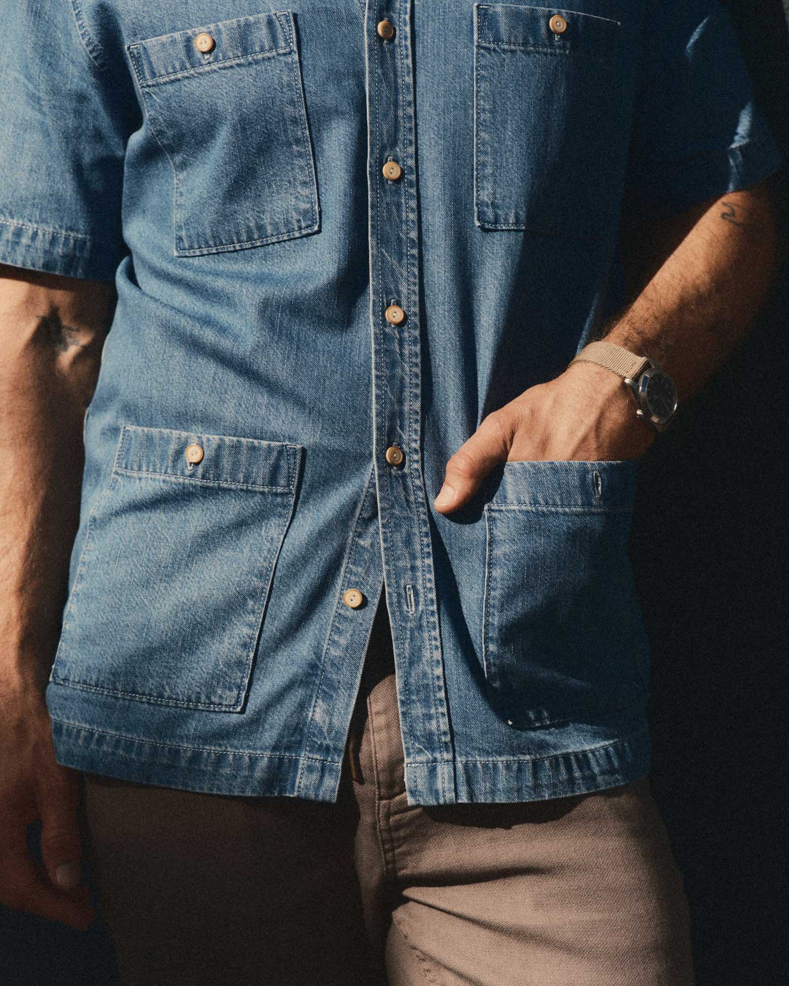 fit model with his hand in the pocket of The Gulf Shirt in Washed Indigo Twill, Wovens by Taylor Stitch