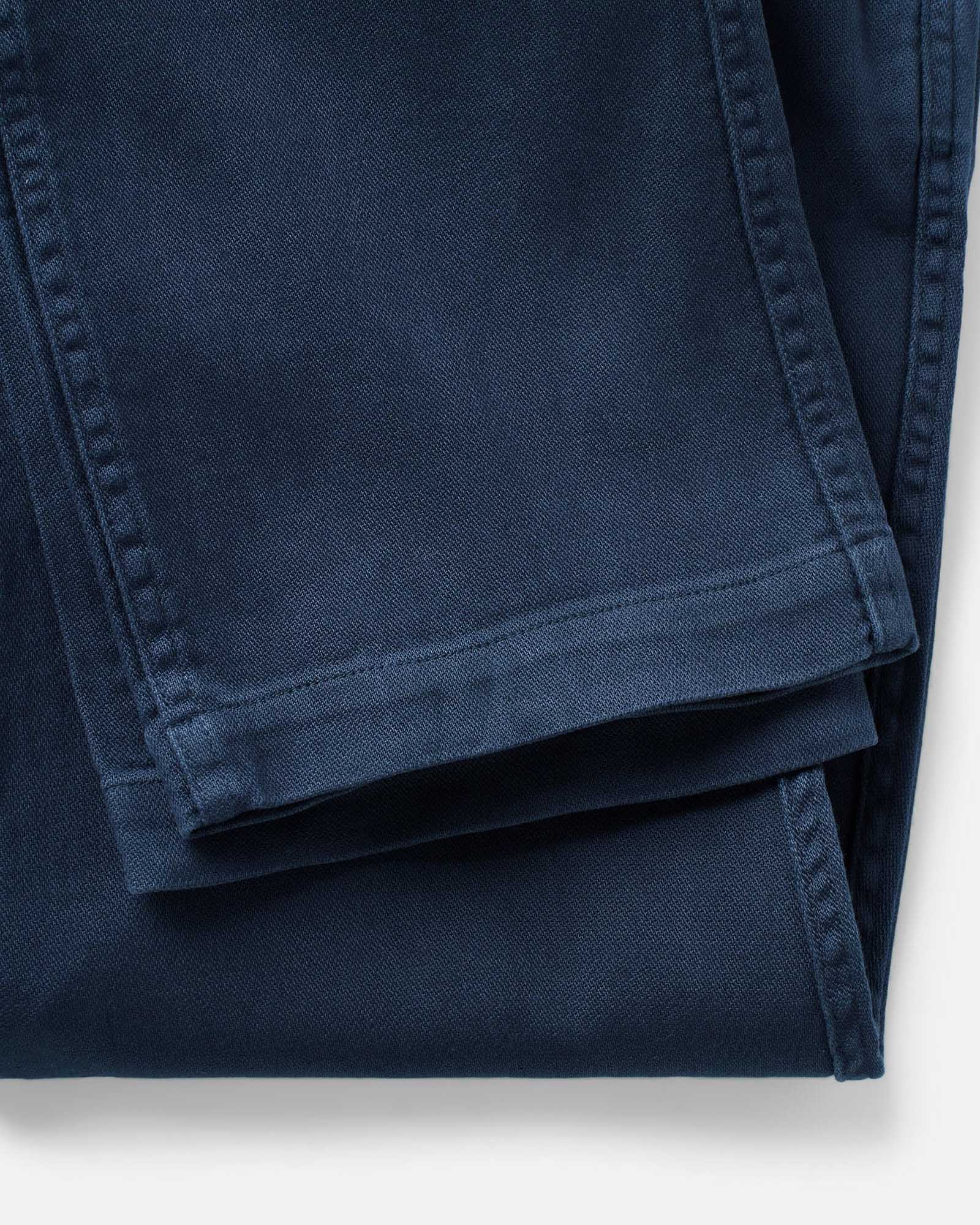 material shot of the hem on The Roamer Pant in Navy Broken Twill, Bottoms by Taylor Stitch