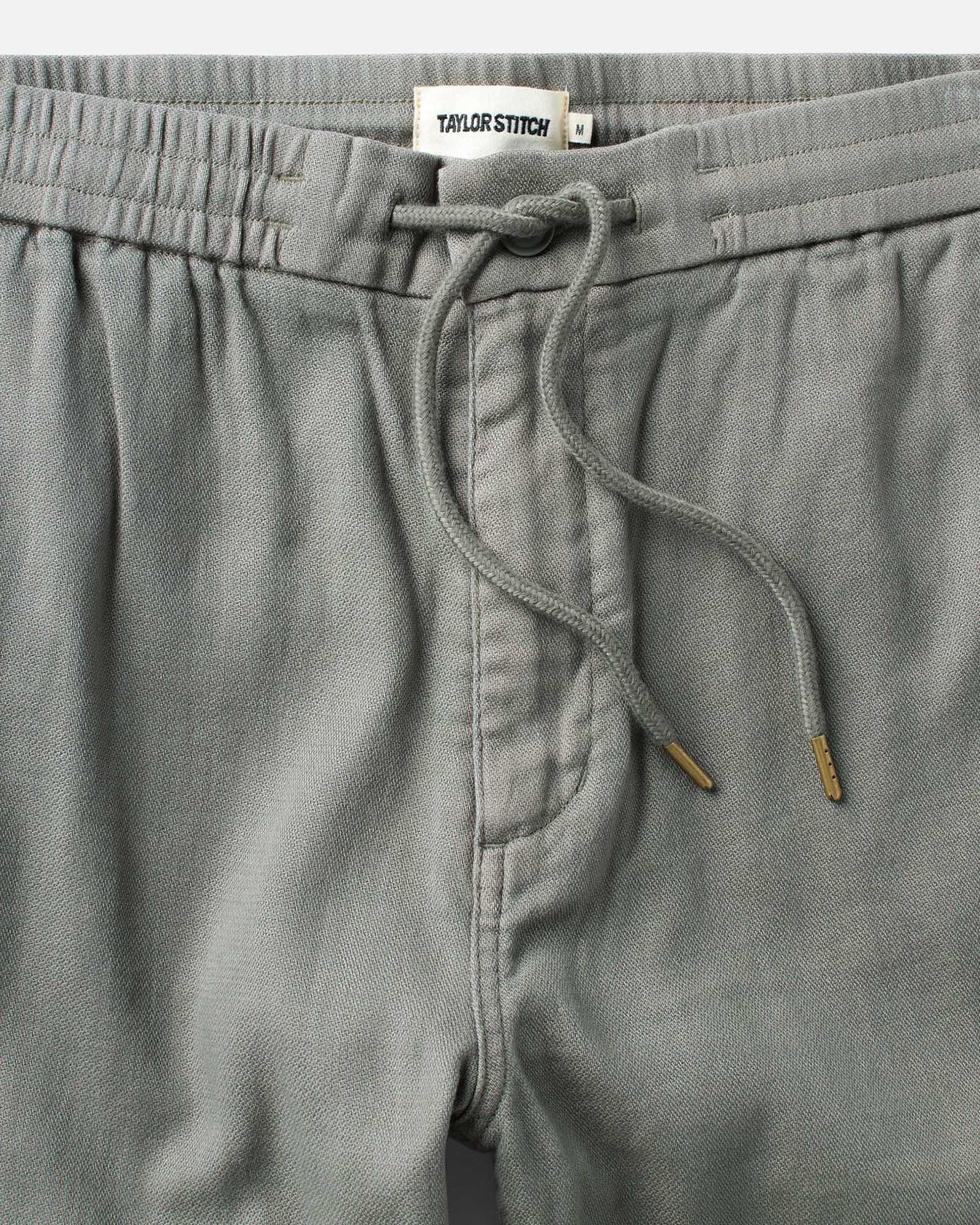 material shot of the waistband on The Roamer Pant in Smoked Olive Broken Twill, Bottoms by Taylor Stitch