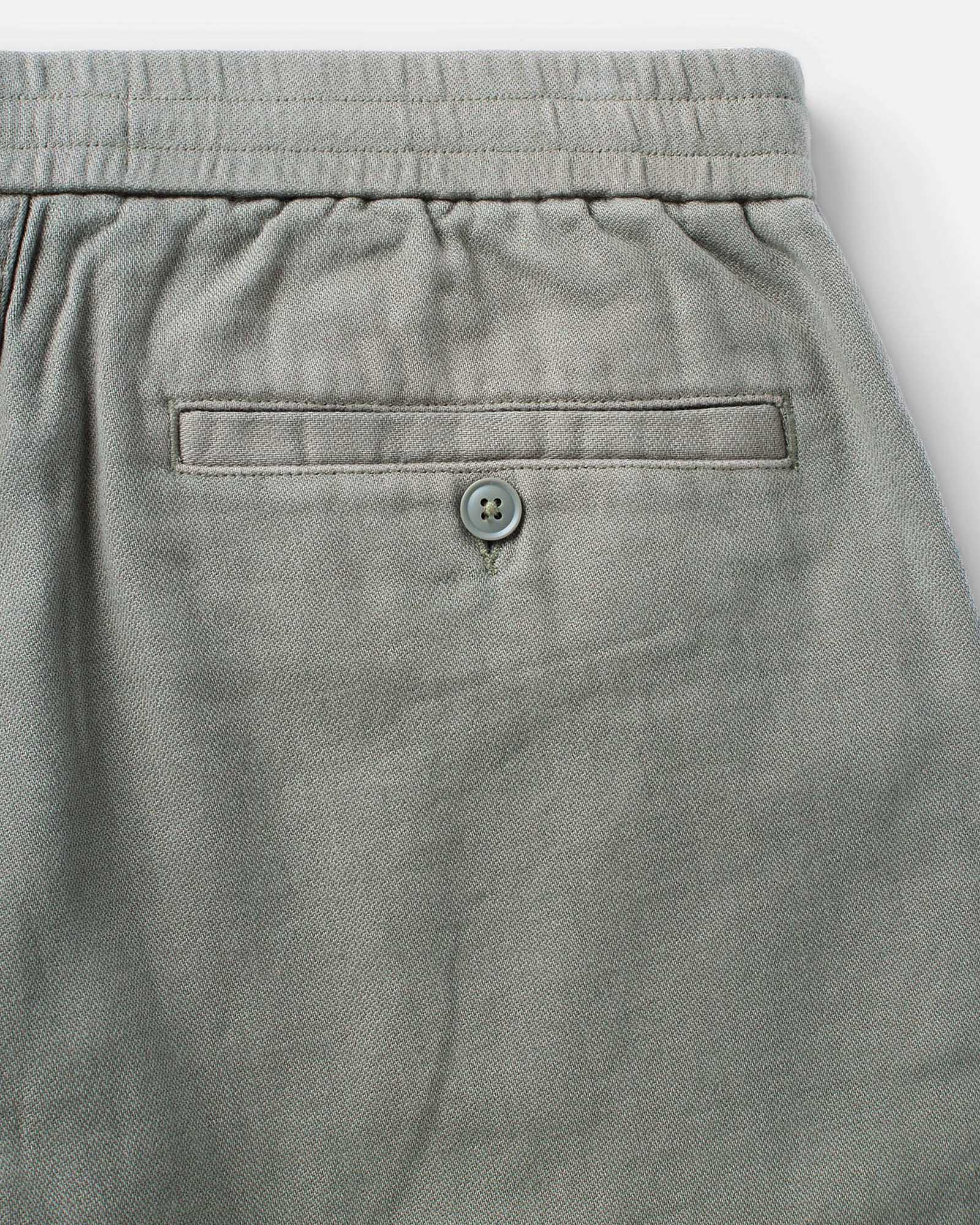 material shot of the back pocket on The Roamer Pant in Smoked Olive Broken Twill, Bottoms by Taylor Stitch