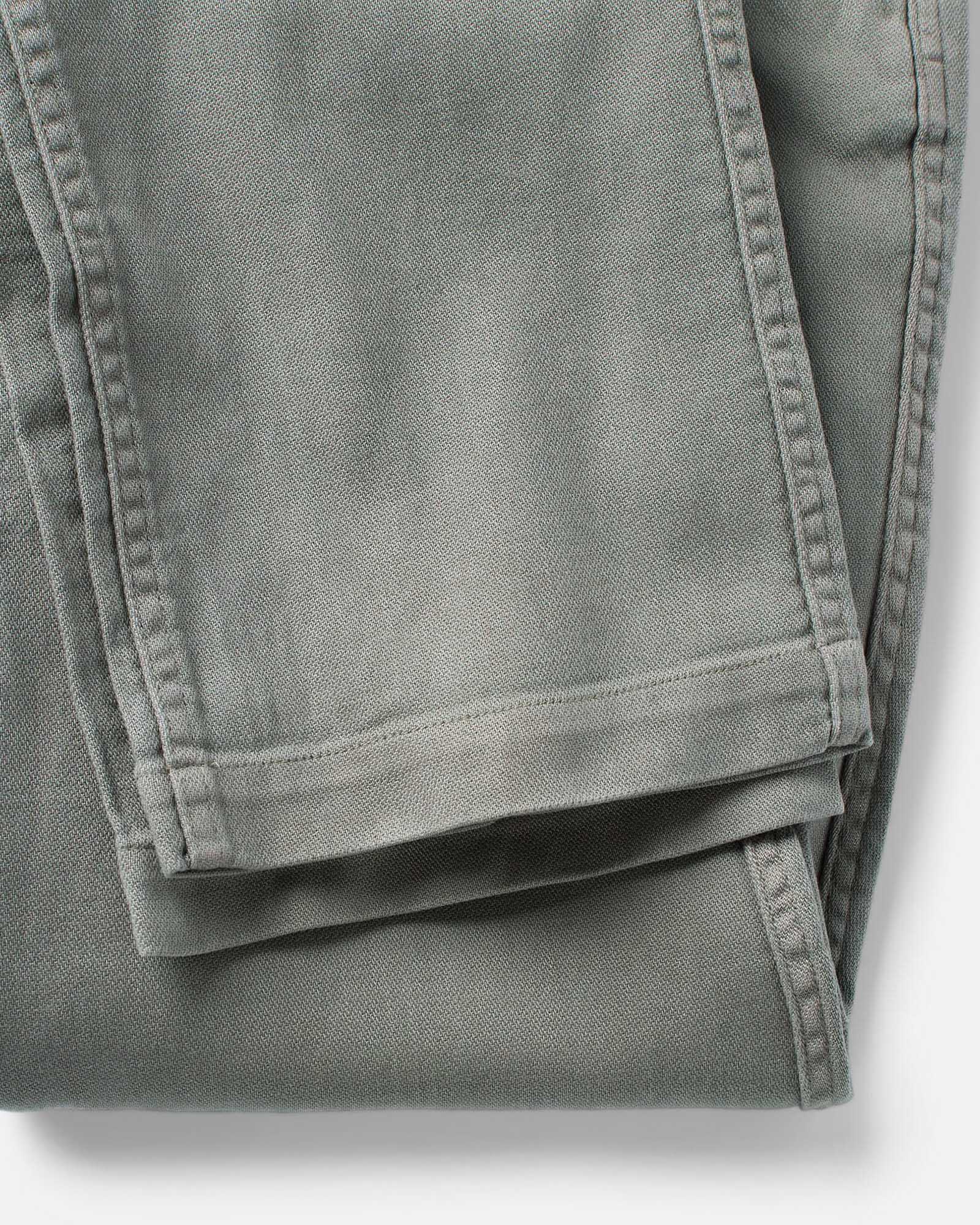 material shot of the hem on The Roamer Pant in Smoked Olive Broken Twill, Bottoms by Taylor Stitch