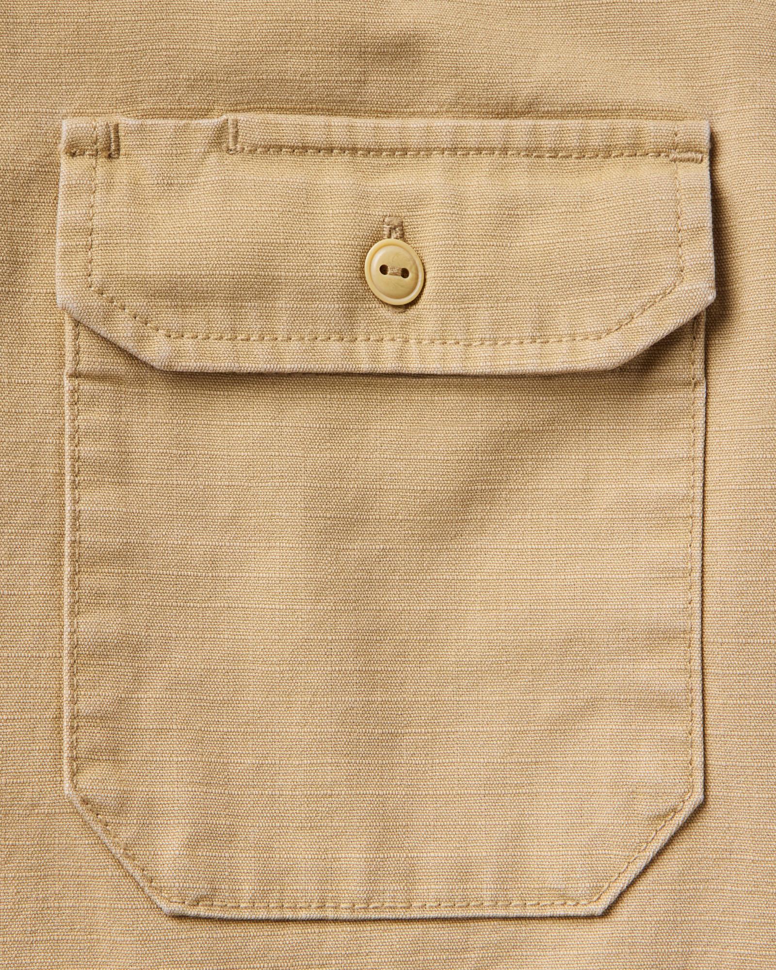 material shot of the pocket on The Short Sleeve Mechanic Shirt in Khaki Ripstop, Wovens by Taylor Stitch