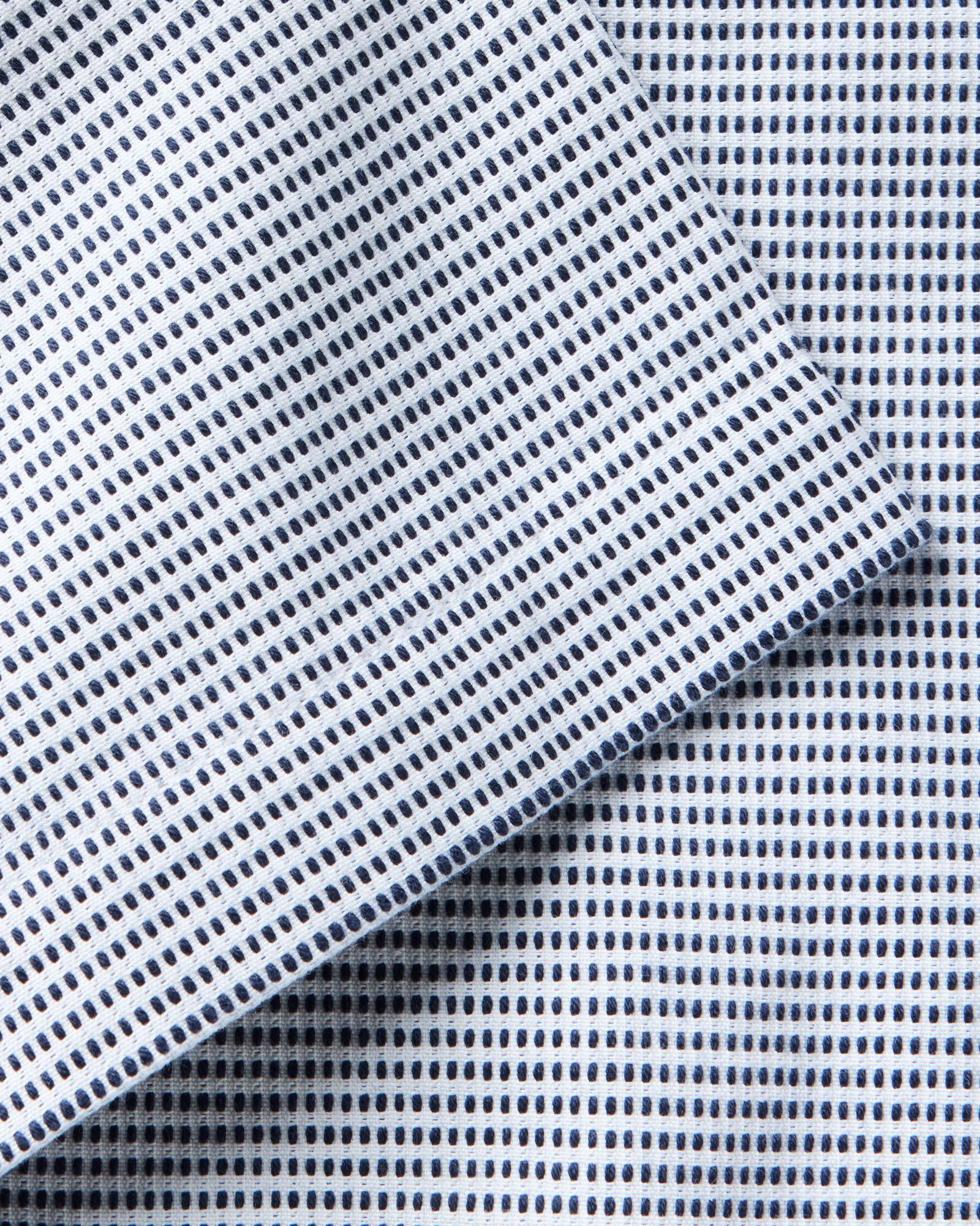 material shot of the sleeve on The Hawthorne Shirt in Blue Pin Dot Dobby, Wovens by Taylor Stitch