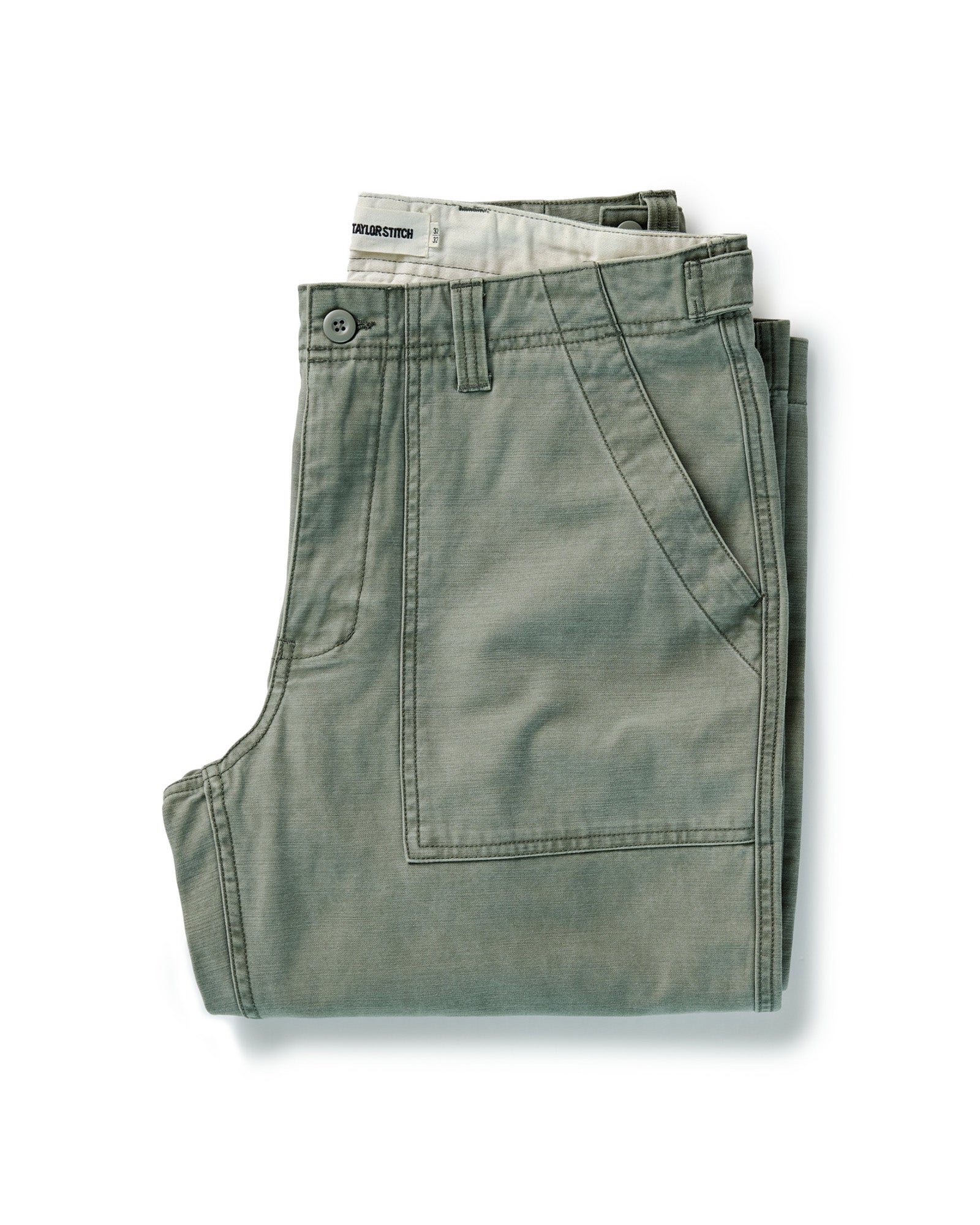 folded flatlay of The Surplus Pant in Field Olive Reverse Sateen, Bottoms by Taylor Stitch