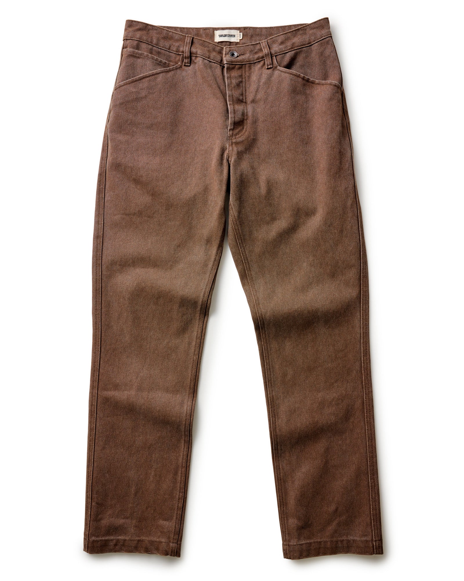 fit model adjusting cuffs on The Camp Pant in Aged Penny Chipped Canvas, Bottoms by Taylor Stitch