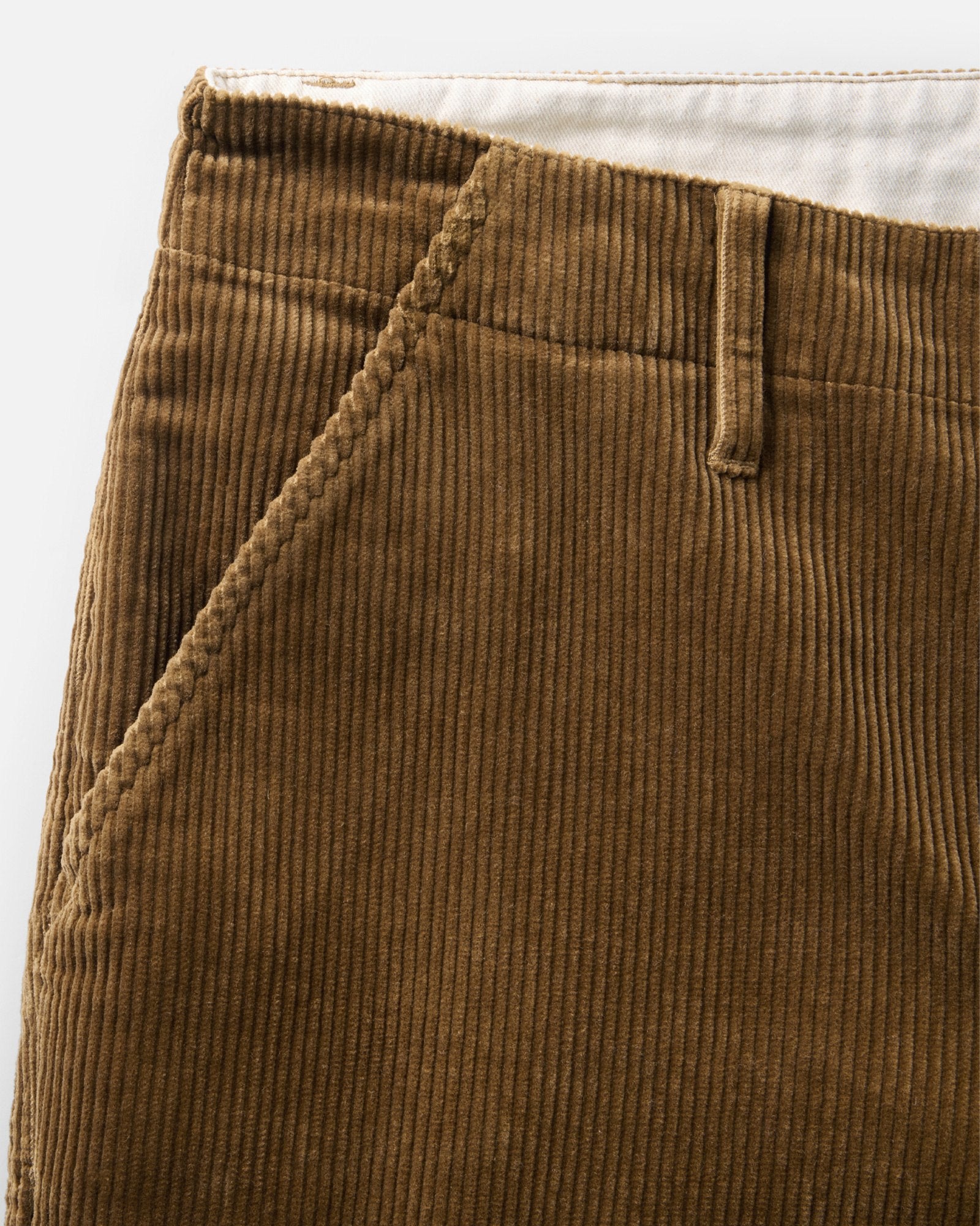 material shot of the zipper fly on The Carnegie Pant in Bourbon Corduroy, Bottoms by Taylor Stitch