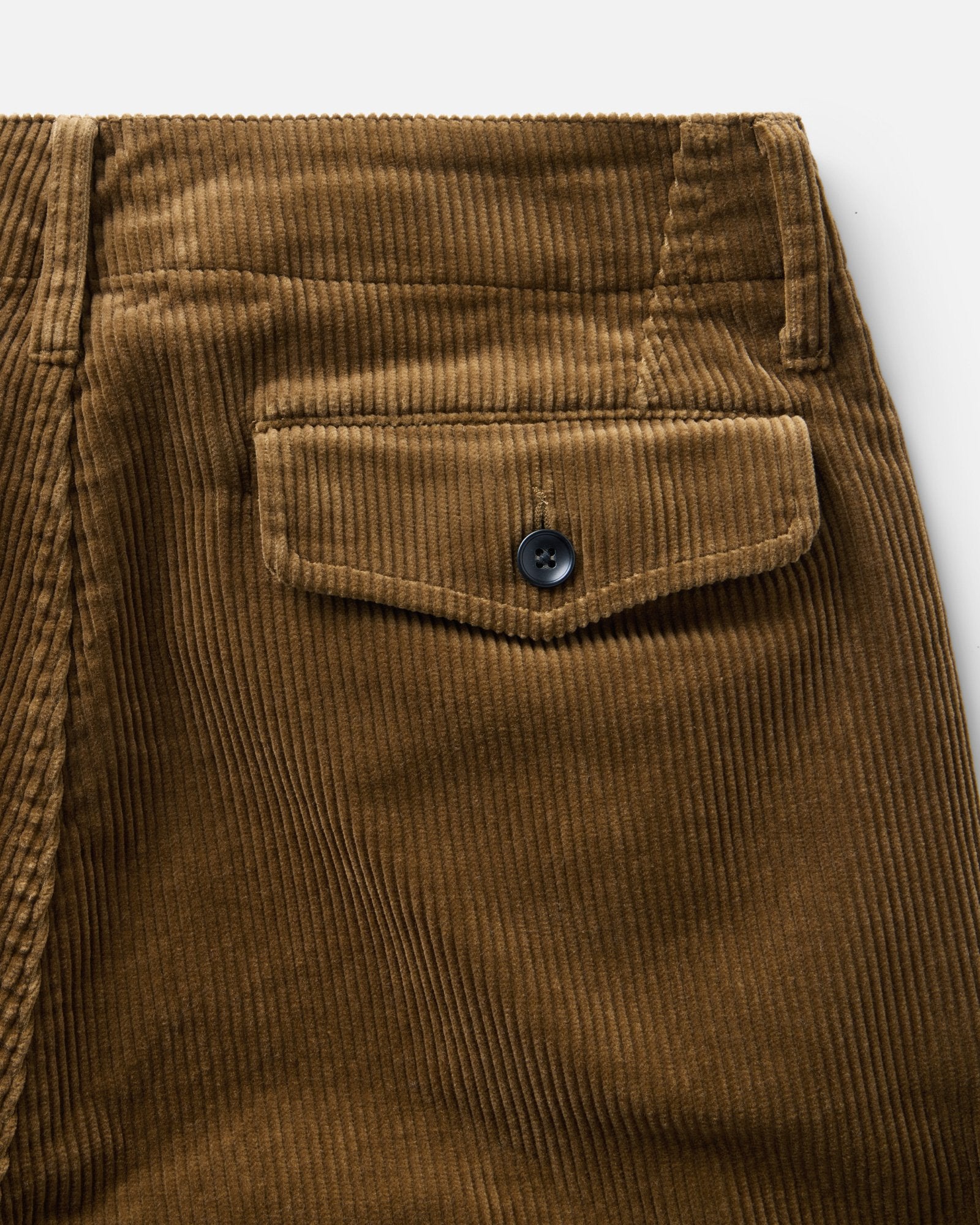 material shot of the back pocket on The Carnegie Pant in Bourbon Corduroy, Bottoms by Taylor Stitch