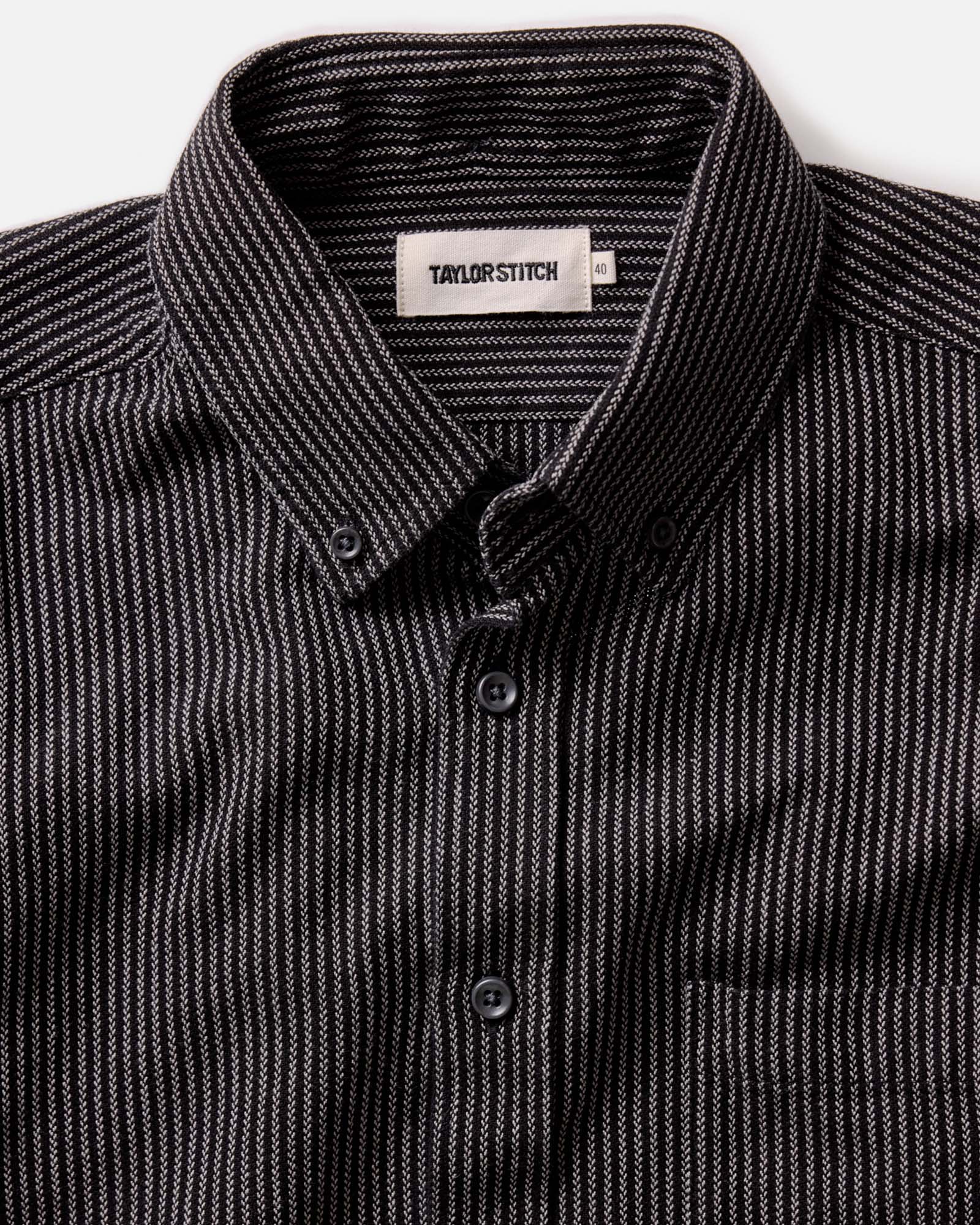fit model showing off the collar on The Jack in Roped Black Indigo, Wovens by Taylor Stitch