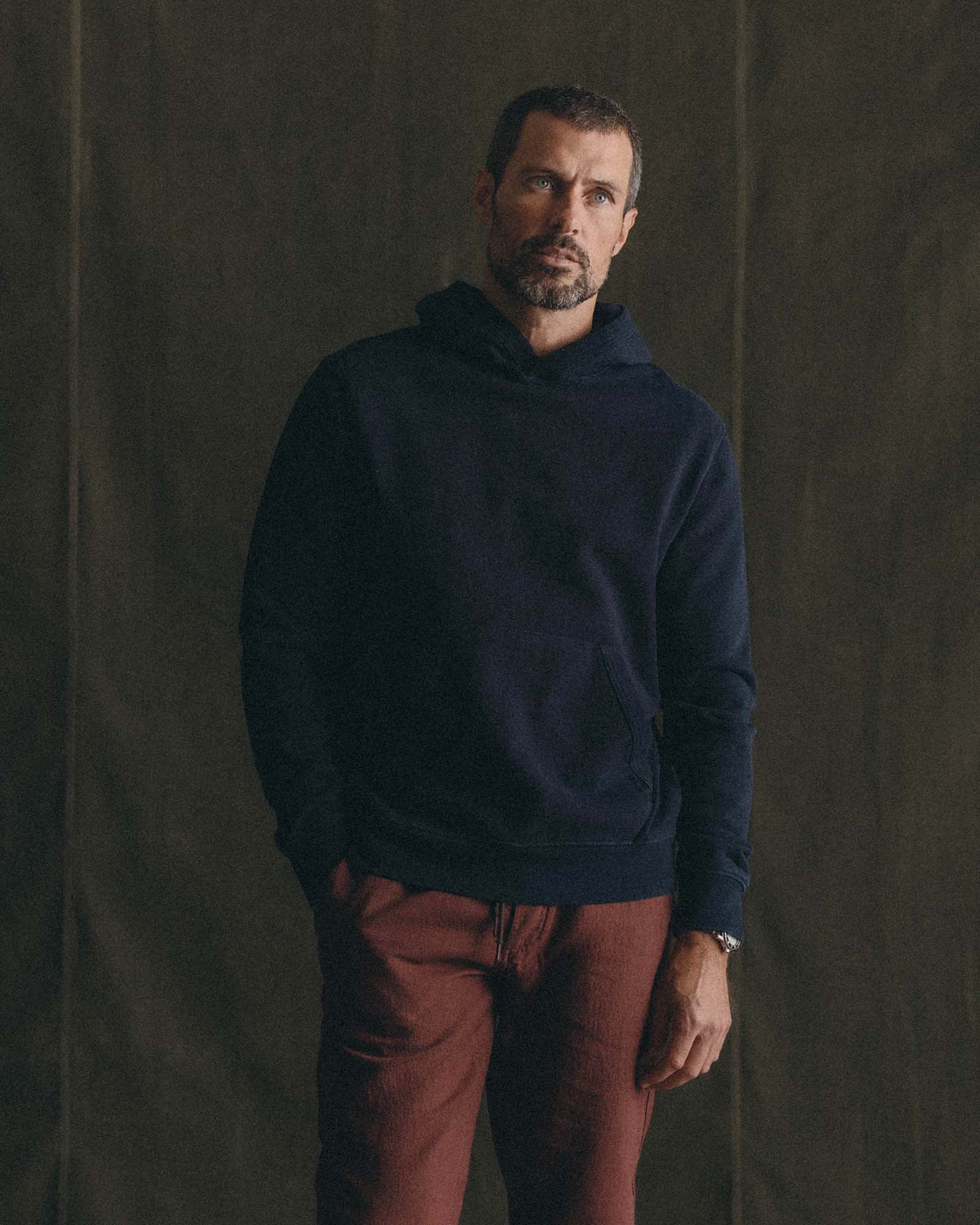 fit model in The Apres Hoodie in Indigo Terry, Knits by Taylor Stitch