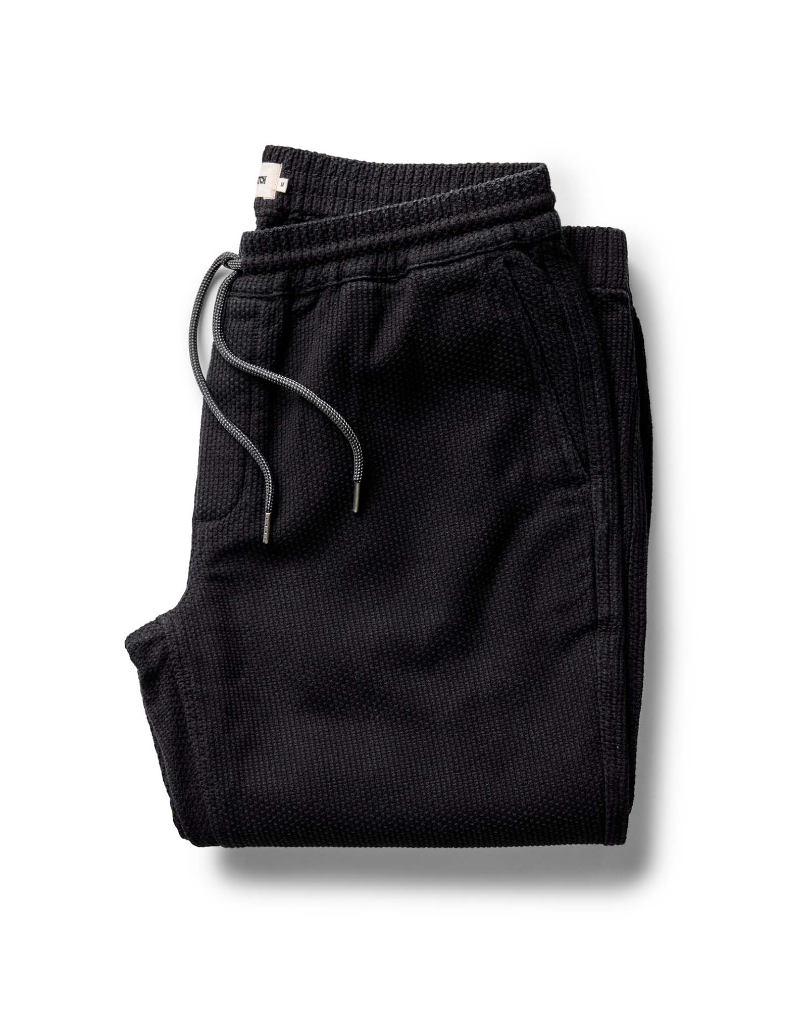 folded flatlay of The Apres Pant in Black Indigo Sashiko, Bottoms by Taylor Stitch