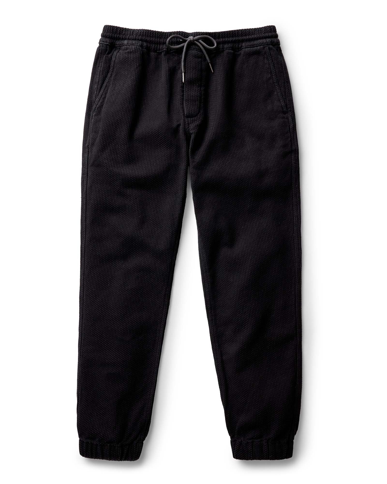flatlay of The Apres Pant in Black Indigo Sashiko, Bottoms by Taylor Stitch