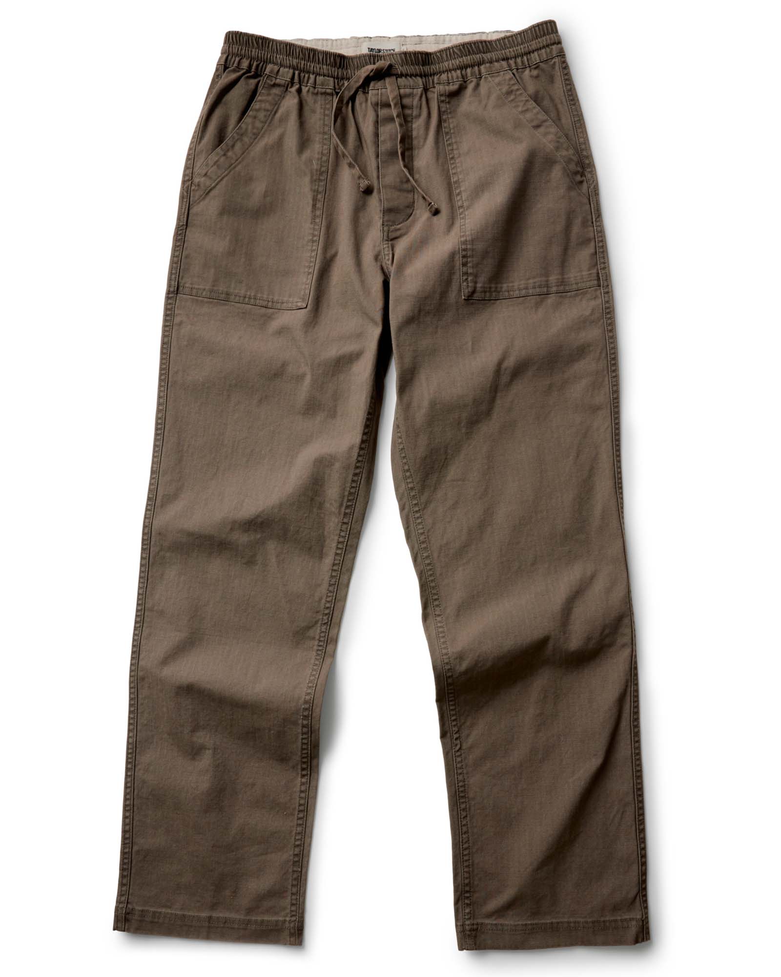 material shot of the back pocket on The Breakwater Pant in Mushroom Ripstop, Bottoms by Taylor Stitch