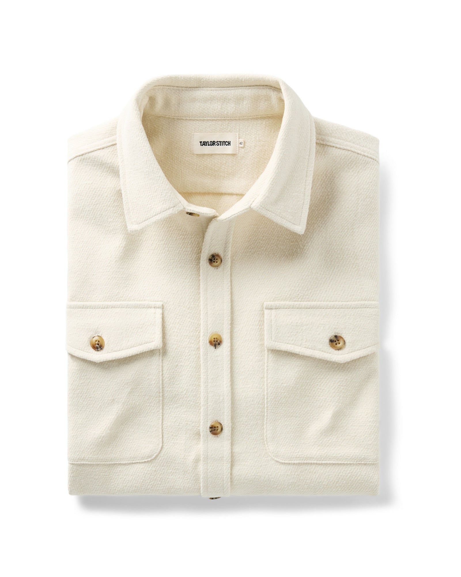 folded flatlay of The Maritime Shirt Jacket in Vintage White Moleskin Twill, Outerwear by Taylor Stitch