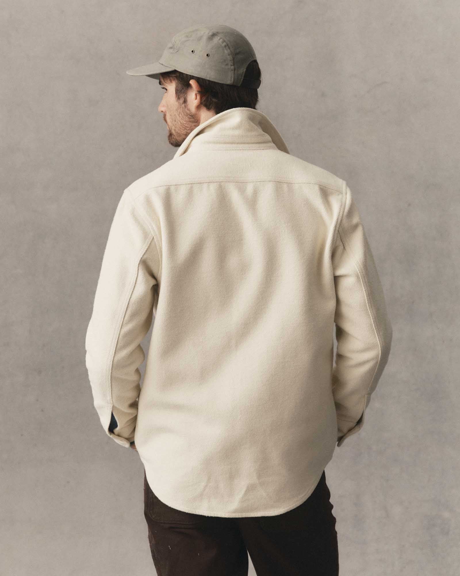 fit model showing off the back of The Maritime Shirt Jacket in Vintage White Moleskin Twill, Outerwear by Taylor Stitch