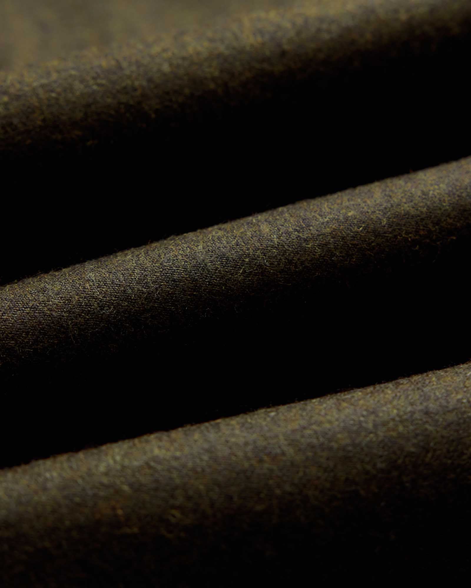 material shot of the fabric on The Stevens Trouser in Black Olive Wool Flannel, Bottoms by Taylor Stitch