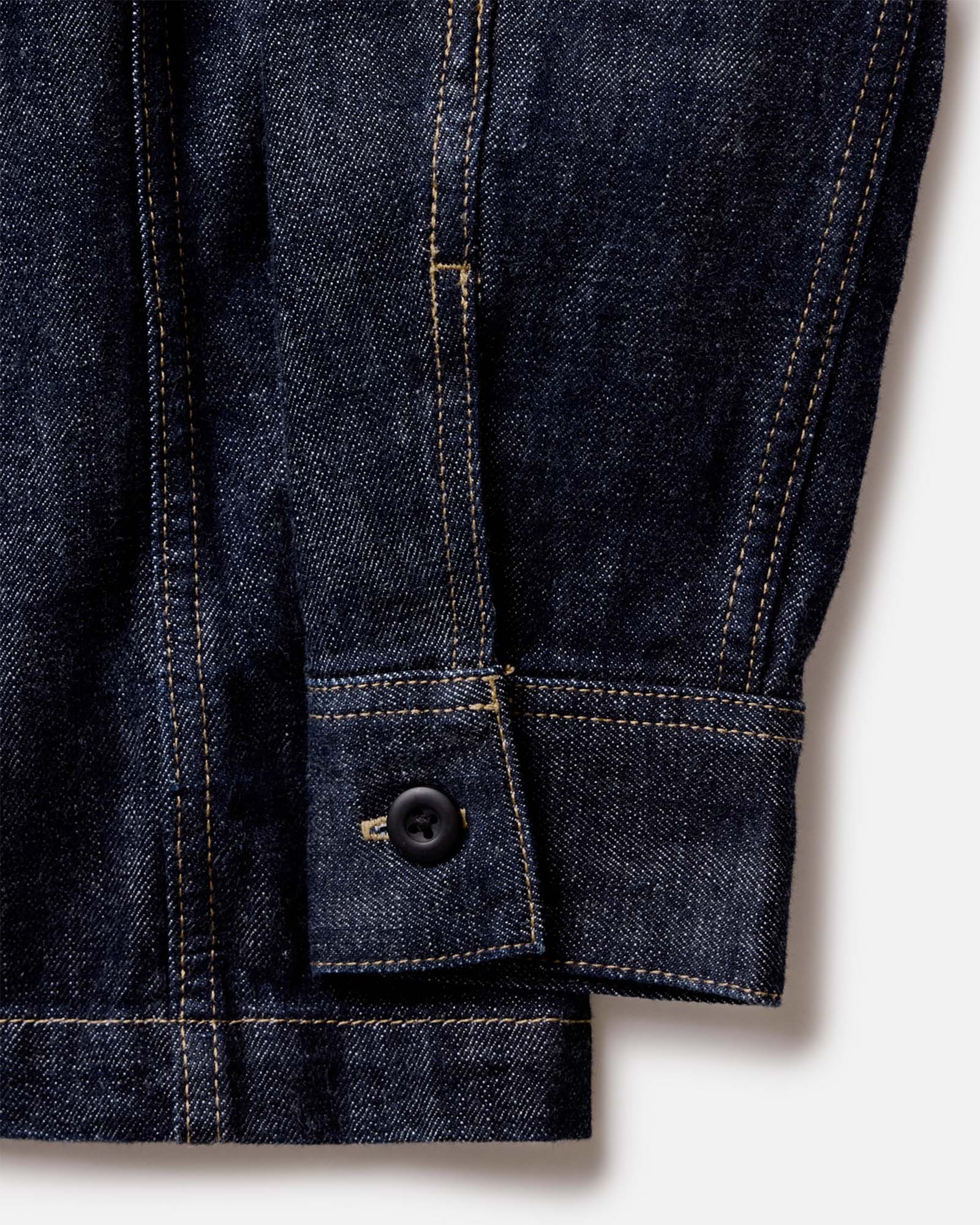 material shot of the cuff on The Shop Shirt in Rinsed Indigo Selvedge, Wovens by Taylor Stitch
