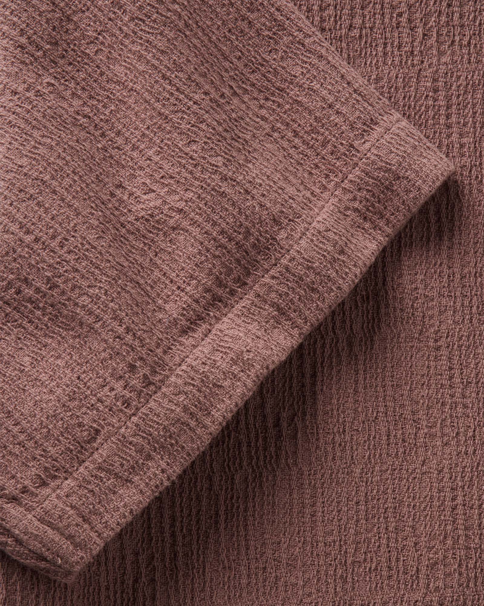 material shot of the sleeve on The Short Sleeve California in Redwood Hacci, Wovens by Taylor Stitch