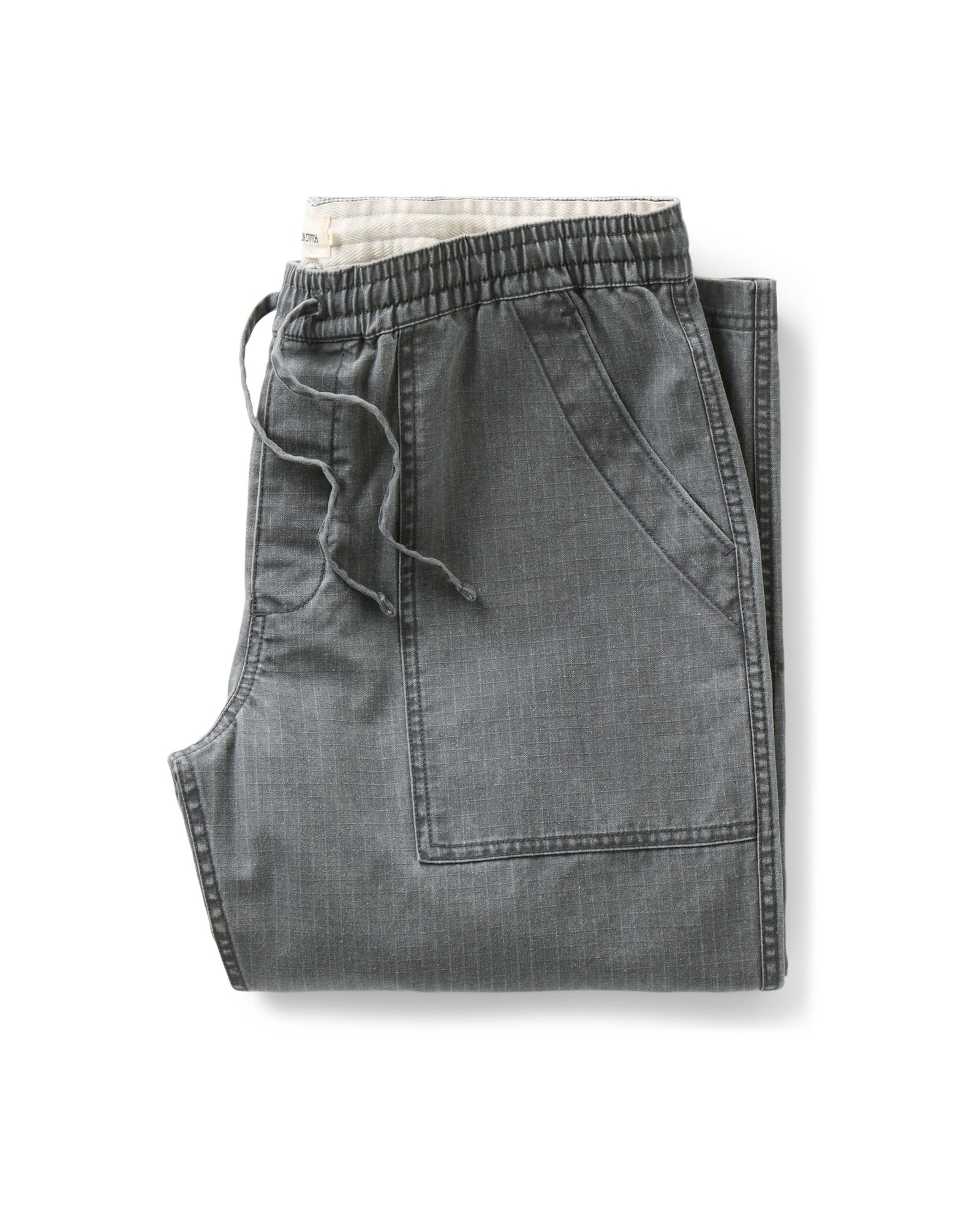 folded flatlay of The Breakwater Pant in Dark Grey Ripstop, Bottoms by Taylor Stitch
