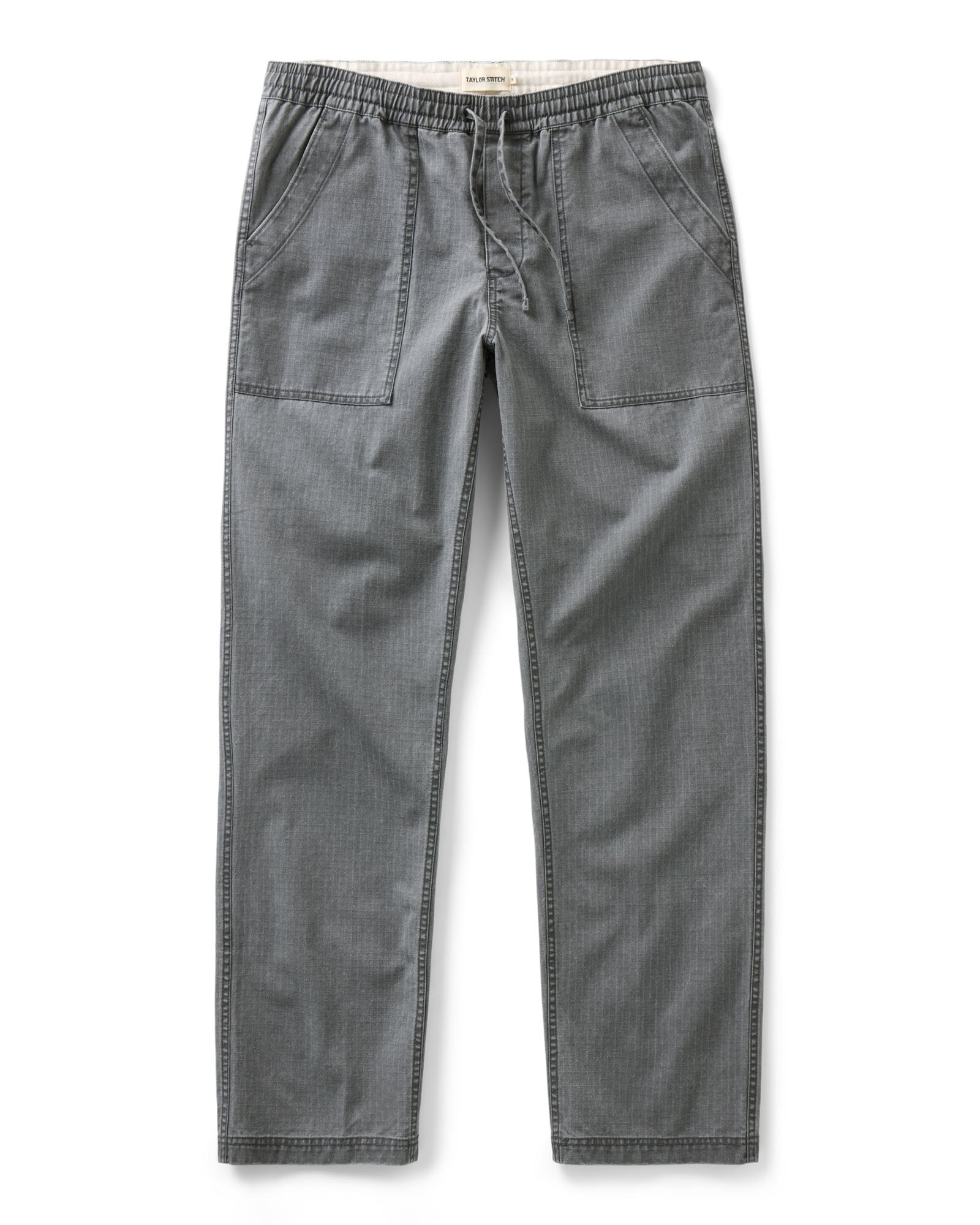 flatlay of The Breakwater Pant in Dark Grey Ripstop, Bottoms by Taylor Stitch