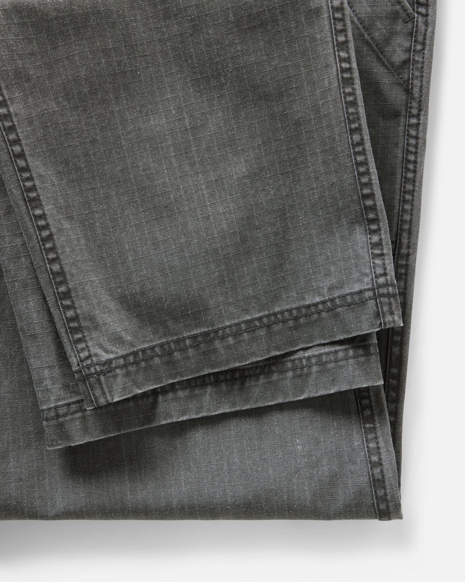 material shot of the hem on The Breakwater Pant in Dark Grey Ripstop, Bottoms by Taylor Stitch