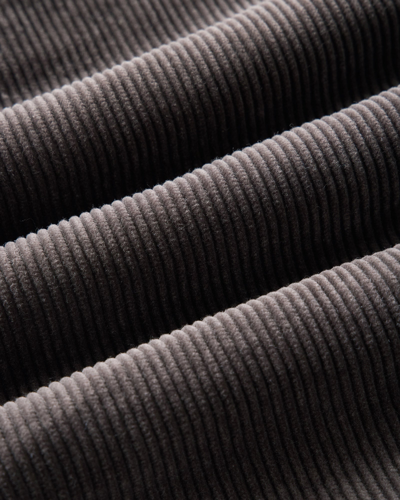 material shot of the fabric on The Carnegie Pant in Soil Corduroy, Bottoms by Taylor Stitch