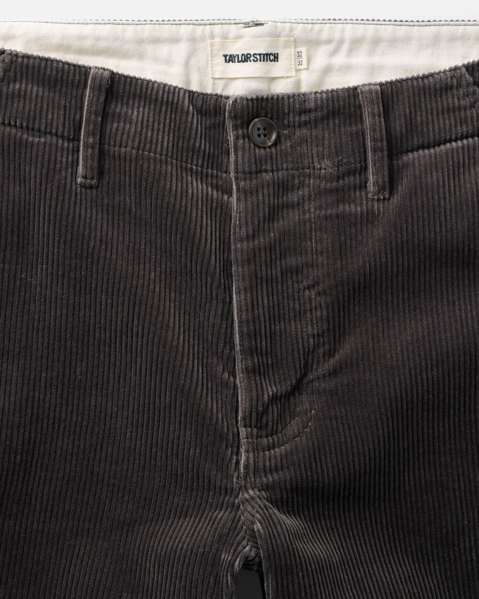 material shot of the waistband on The Carnegie Pant in Soil Corduroy, Bottoms by Taylor Stitch