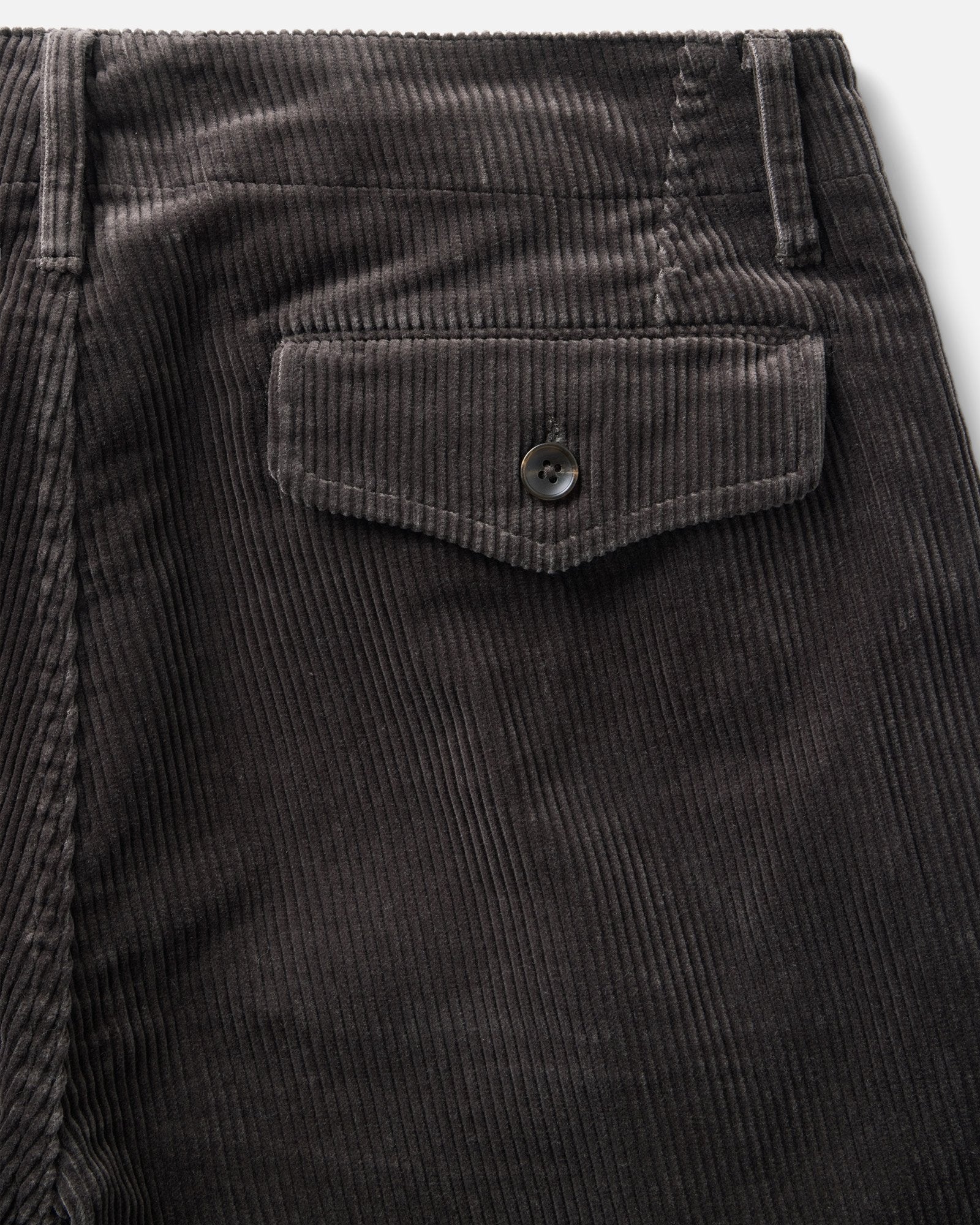 material shot of the back pocket on The Carnegie Pant in Soil Corduroy, Bottoms by Taylor Stitch